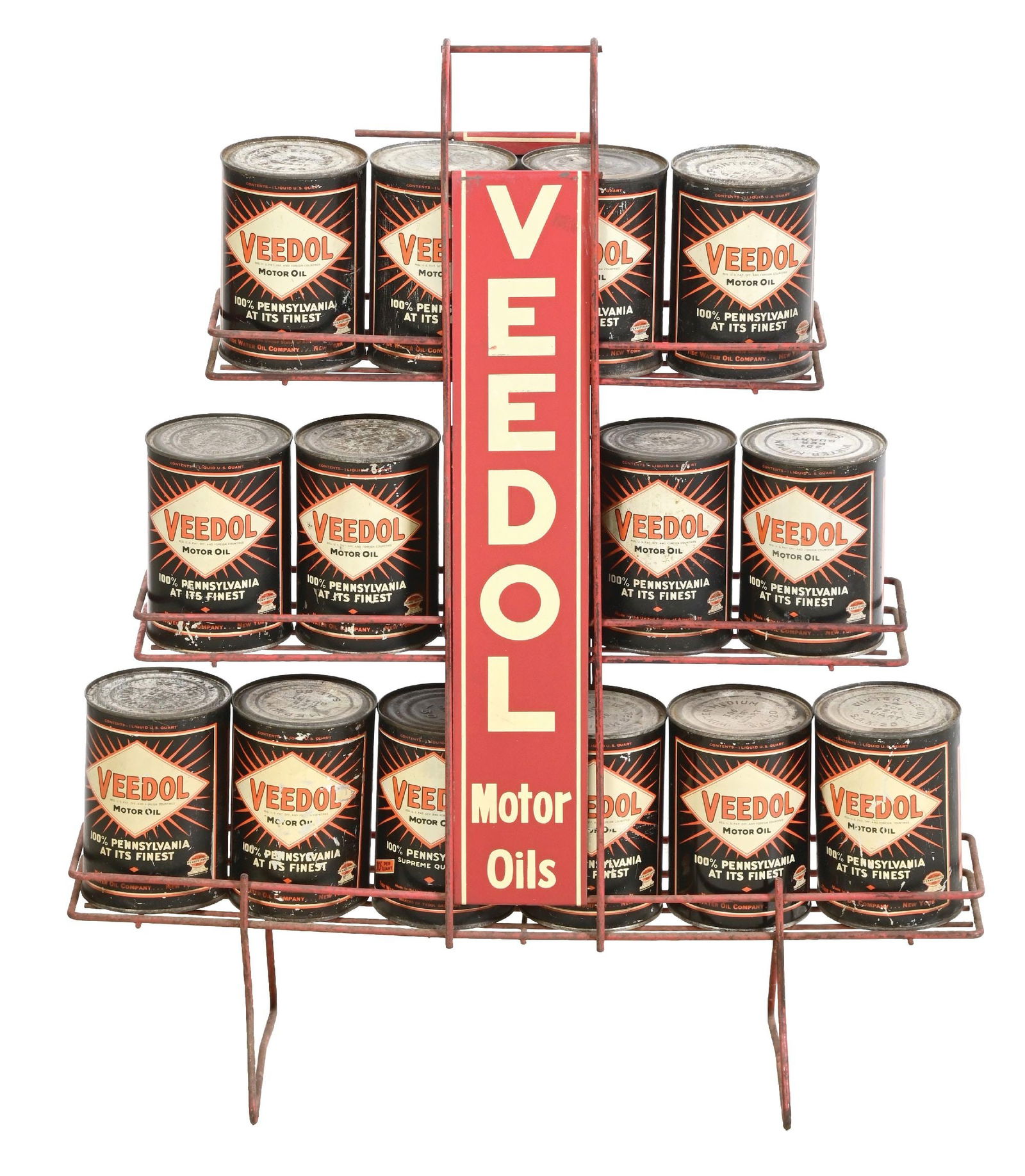 VEEDOL MOTOR OIL DISPLAY RACK WITH 15 ONE-QUART OIL CANS: Original Veedol Motor Oil Service Station Rack showing two Tin Signs with 15 individual One-Quart Cans. CONDITION: In good condition overall, showing with cans ranging from grade 7.0 to 9.0. Metal sig