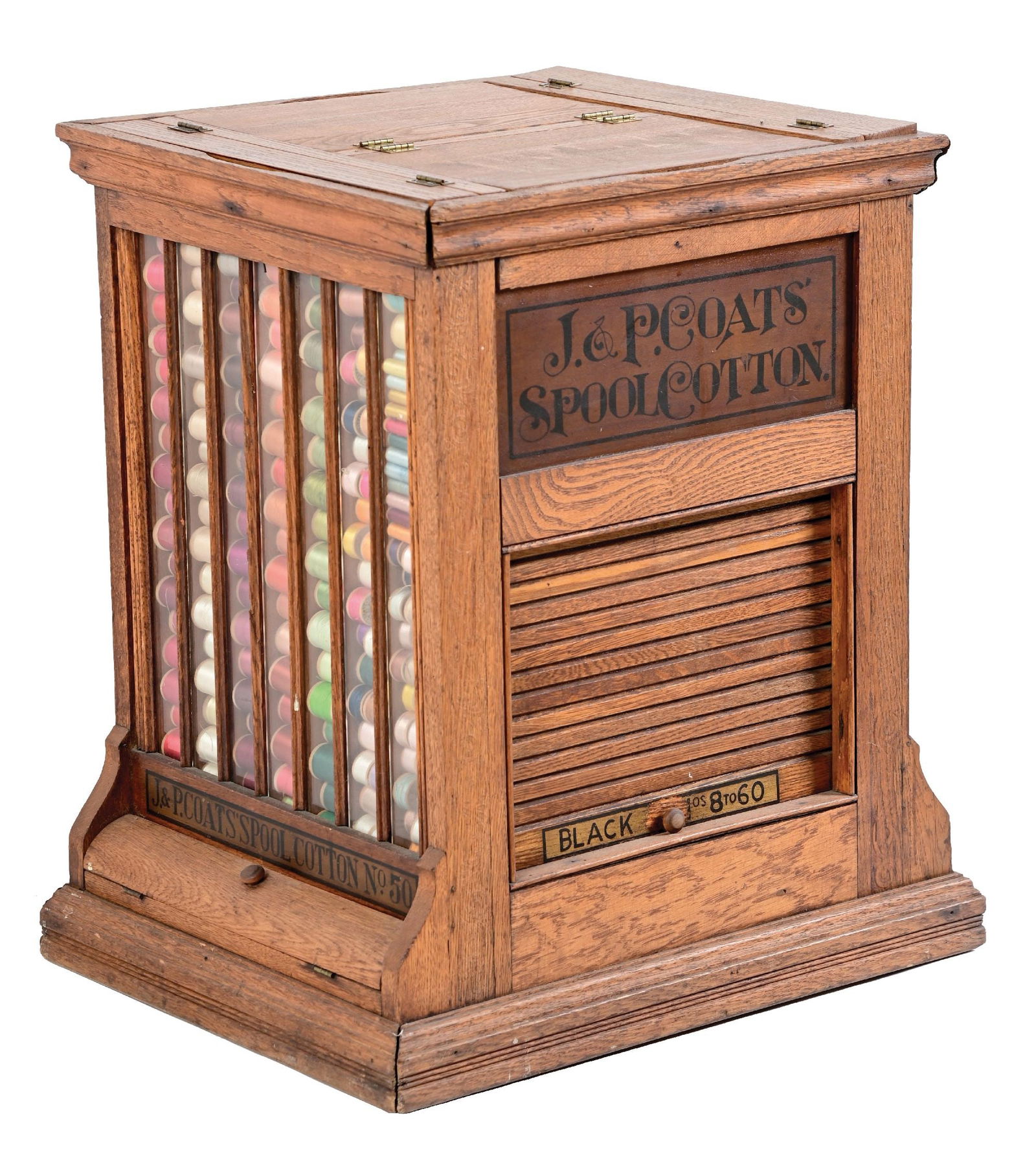 J. & P. COATS SPOOL COTTON DISPLAY CABINET: CONDITION: An original countertop display cabinet with two glass sides and two roll-up sides. It has original stenciling, interior, and comes with a relatively complete assortment of thread. The unit
