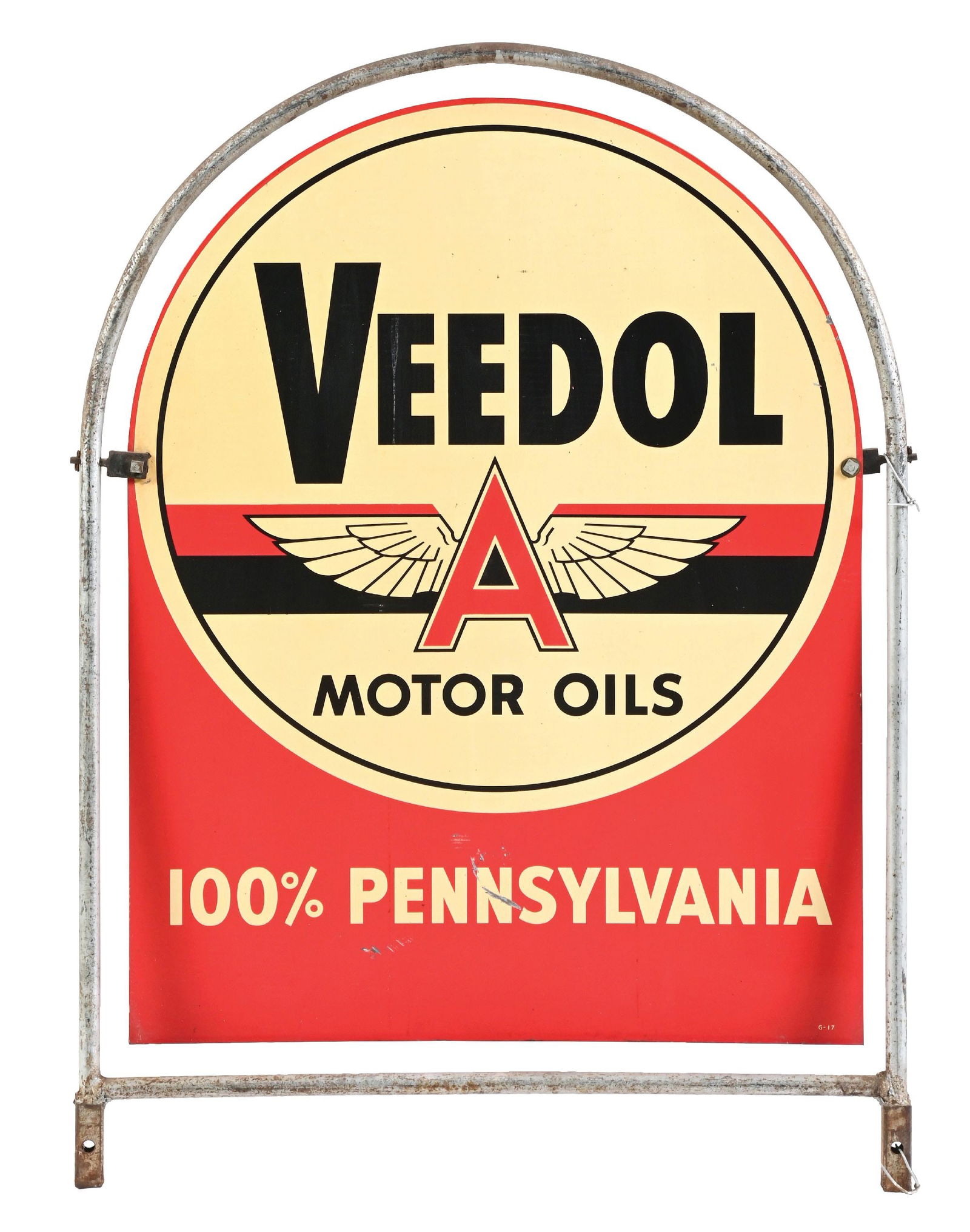 VEEDOL MOTOR OILS TIN TOMBSTONE SIGN W/ METAL STAND: DST. CONDITION: Excellent color and gloss, with minor areas of light surface scratching on each side with some minimal areas of edge wear. Sign dismounted in its original stand, but is missing its leg