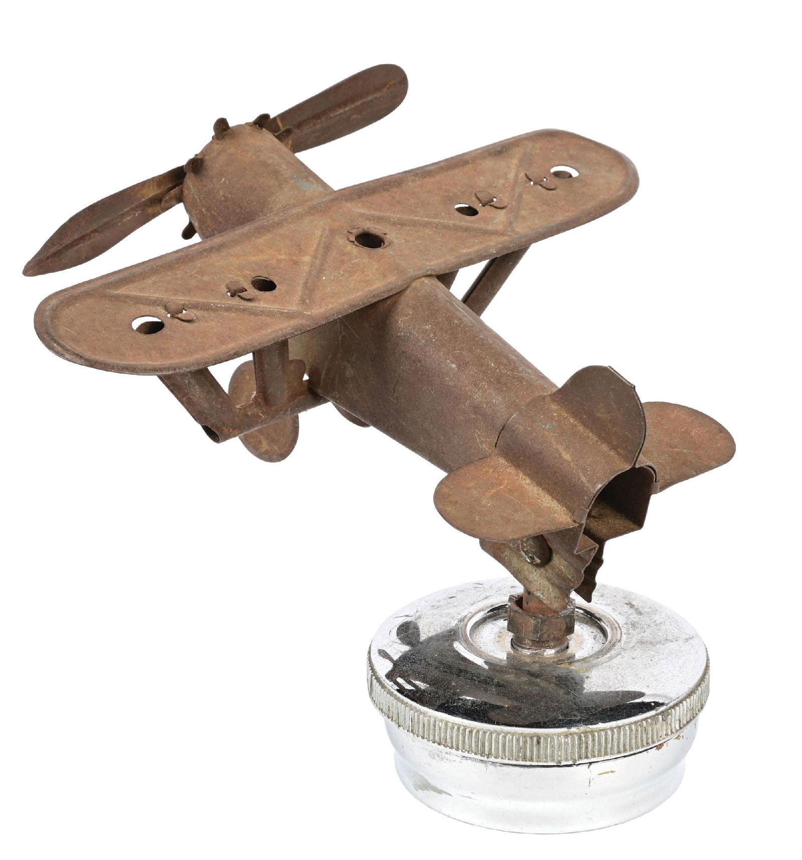 MONOPLANE FIGURAL AIRPLANE CAR HOOD ORNAMENT: C. 1930s. CONDITION: Very good original condition throughout, showing excellent age and patina with no heavy damage. Propeller spins freely, and is mounted to a period era radiator cap for display. A