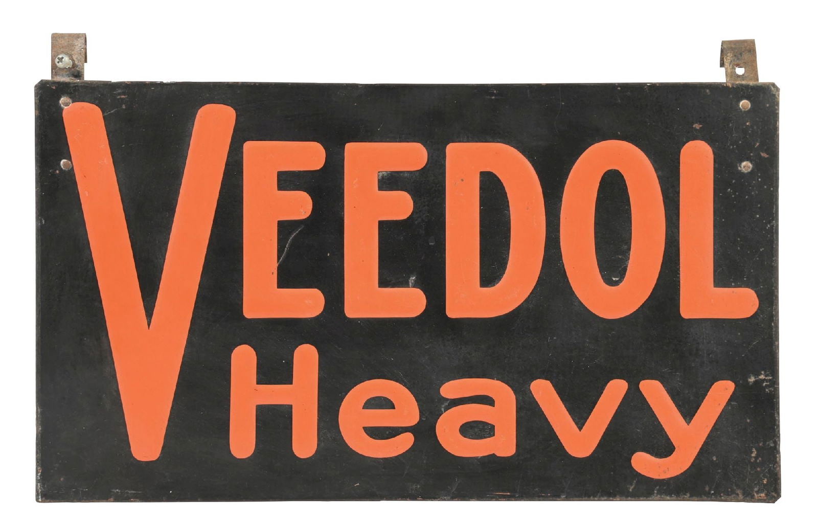 VEEDOL HEAVY MOTOR OIL EMBOSSED TIN SIGN: SST. C. 1930s. CONDITION: Fair color & gloss, with light areas of general wear. Original hanging hooks at the topside intact. A scarce piece for Veedol. Condition: (8.0). Dimensions: 14 - 1/4" x 8".