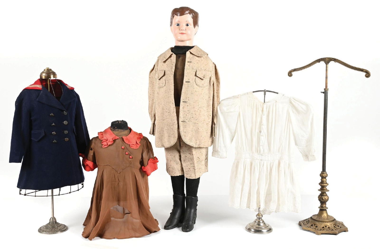 COLLECTION OF 5: GENERAL STORE MANNEQUINS & MANNEGUIN DISPLAYS: CONDITION: It shows original cast bronze country store clothing displays, as well as complete child's mannequin with clothing. The clothing shows areas of wear, tattered holes, and originality. The di