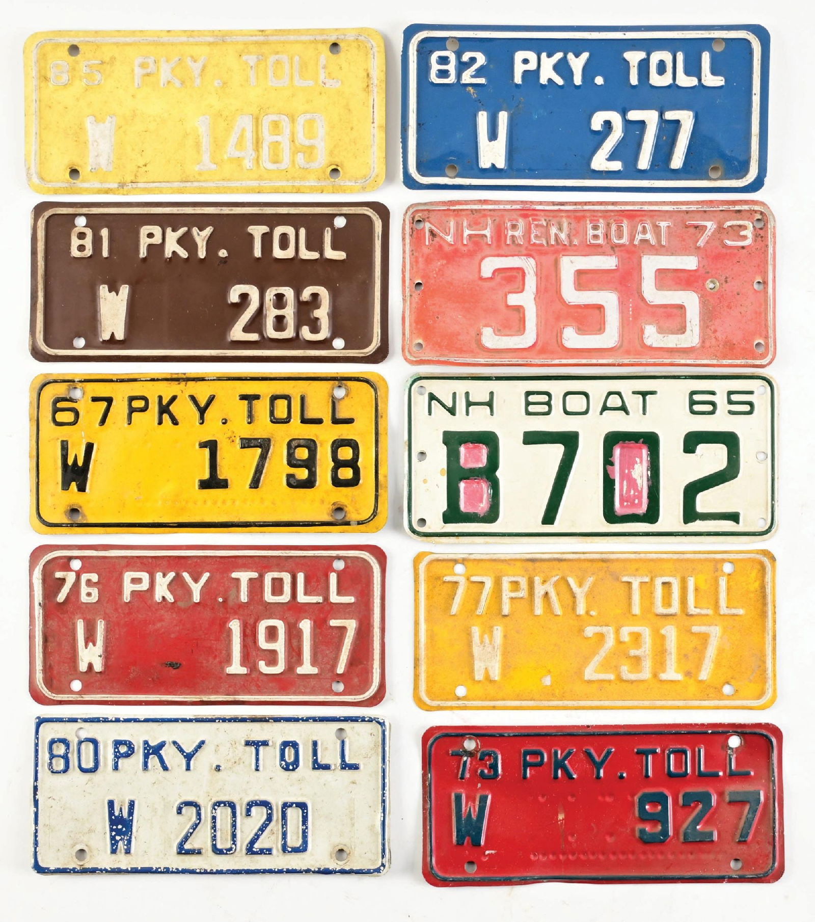COLLECTION OF 10: VARIOUS PKY. TOLL AND BOAT EMBOSSED TIN LICENSE PLATES (1 of 1)