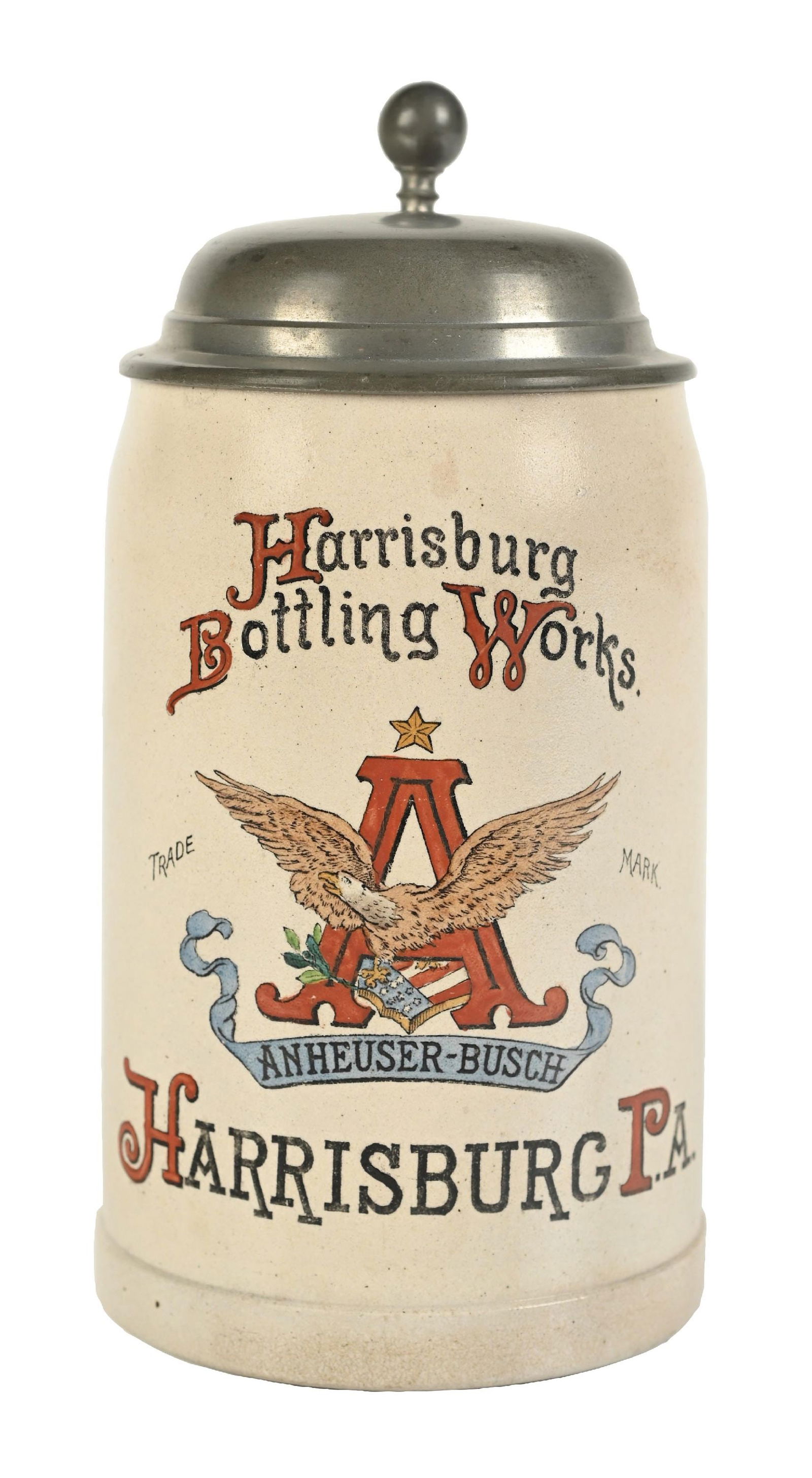 ANHEUSER-BUSCH HARRISBURG BOTTLING WORKS STEIN W/ LID: Pre-Prohibition, c. early 1900s. Hard-to-find tall version. CONDITION: Face is clean with bright colors and minor wear. Condition: (8.75). Dimensions: 7 - 1/2" x 5 - 1/2" x 3 - 1/2".