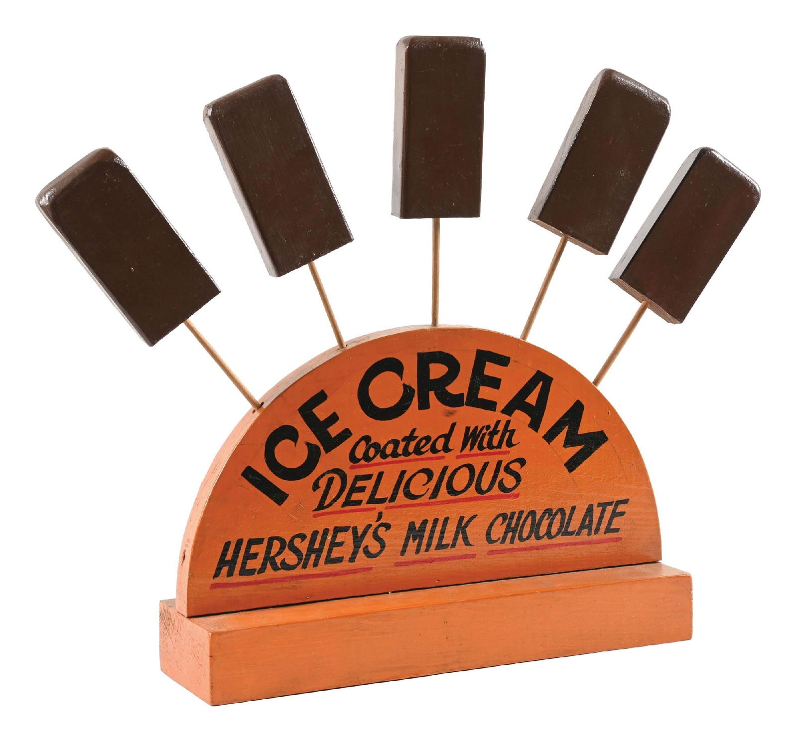 HERSHEY'S MILK CHOCOLATE ICE CREAM COUNTER DISPLAY: CONDITION: It shows an original wood display with five display ice cream pops, which were with Hershey's delicious milk chocolate coating. It shows some areas of wear and soiling due to age. No