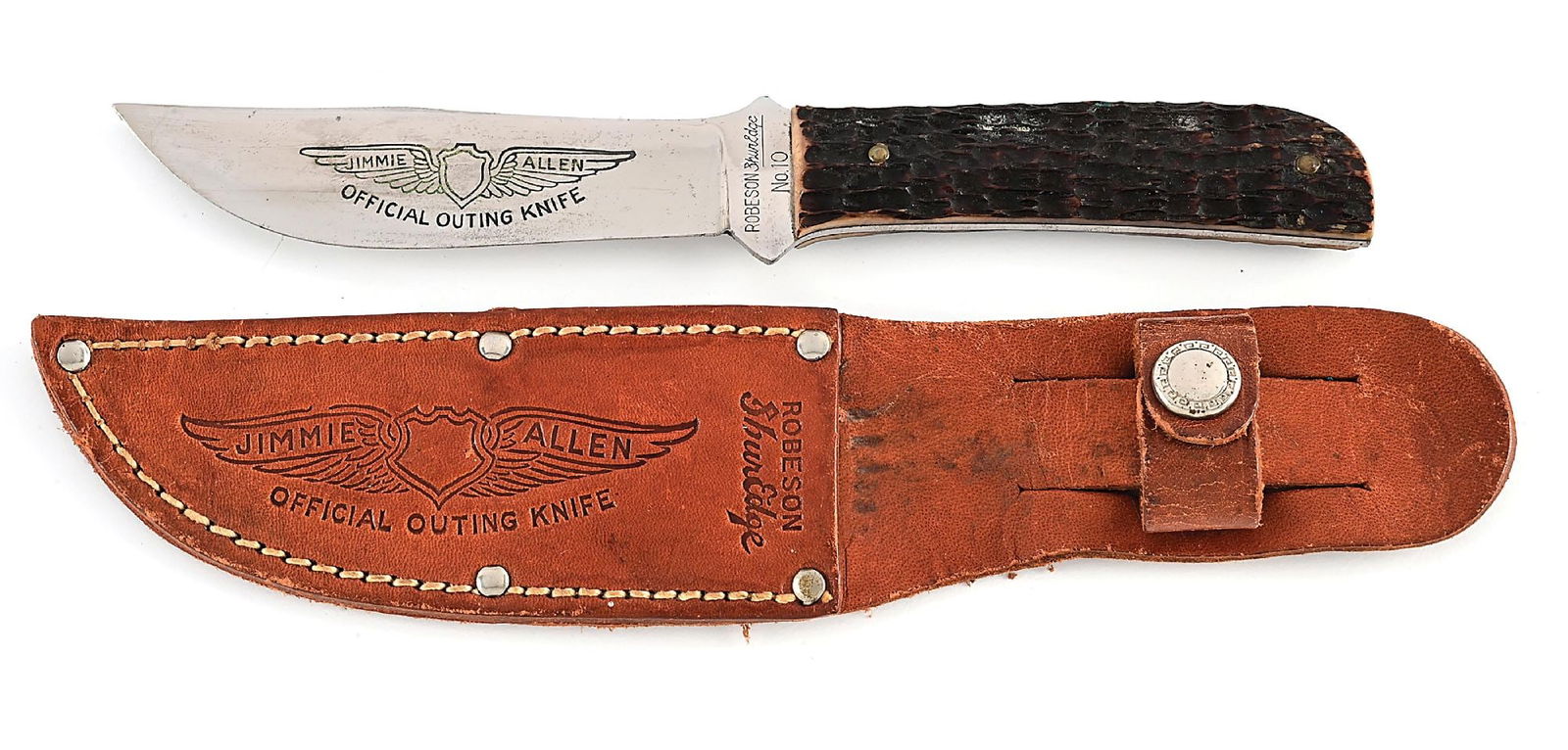 ROBESON SHUREDGE NO. 10 JIMMIE ALLEN OFFICIAL OUTING KNIFE WITH BONE HANDLES.: C. 1930s. Appears unused and unsharpened. Blade is tang stamped on the obverse “ROBESON Shuredge (in script) No. 10” and fully etched “JIMMIE ALLEN OFFICIAL OUTING KNIFE”. Orig