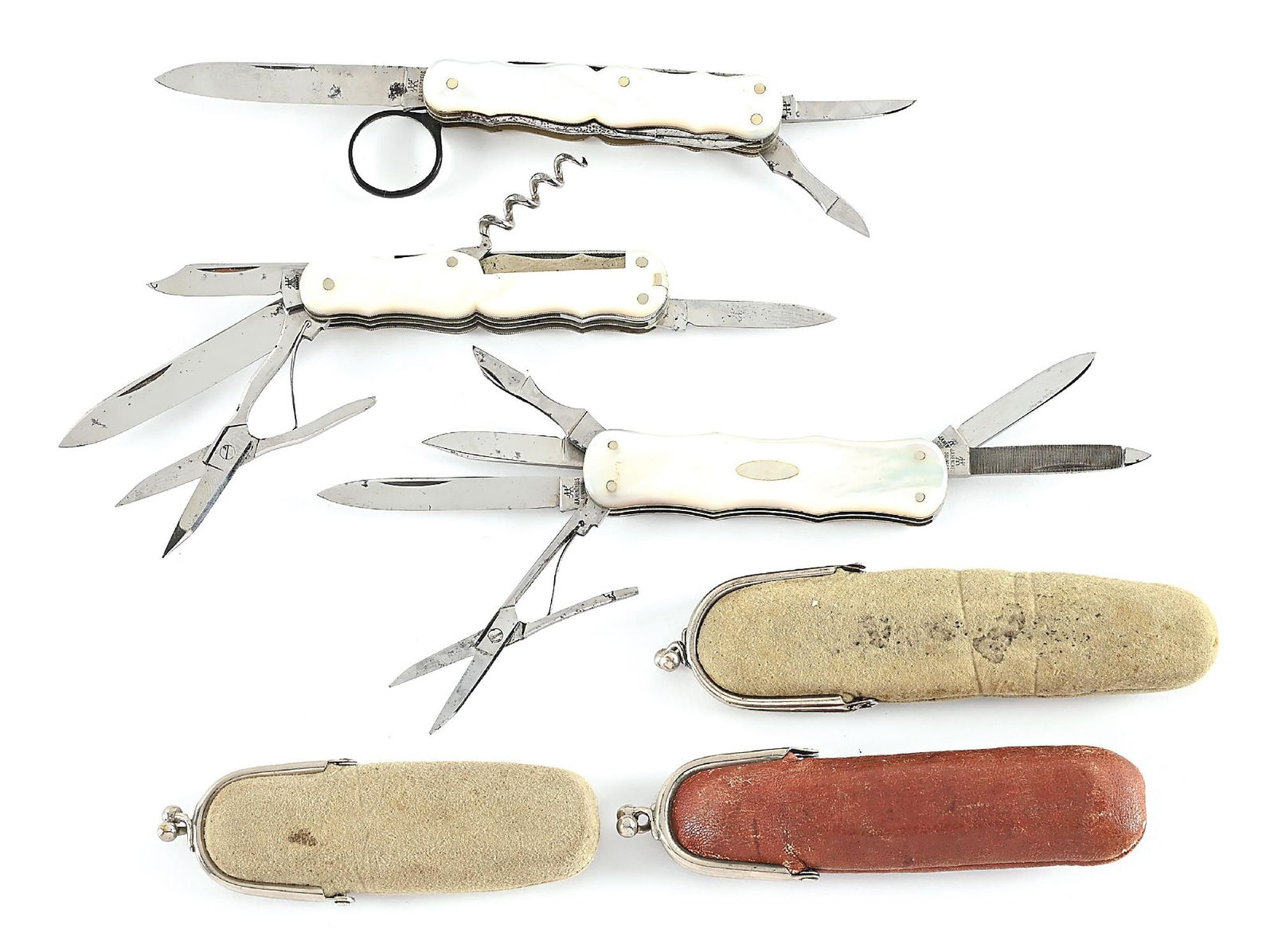 LOT OF 3: J.A. HENCKELS SOLINGEN GERMANY MOTHER OF PEARL MULTI-BLADE KNIVES WITH ORIGINAL PURSES: Lot consists of: (A)Appears unused and unsharpened. Mother of Pearl multi-blade with magnifying glass. Main blade is tang stamped “J.A. Henckels Germany” on obverse. All blades open and cl