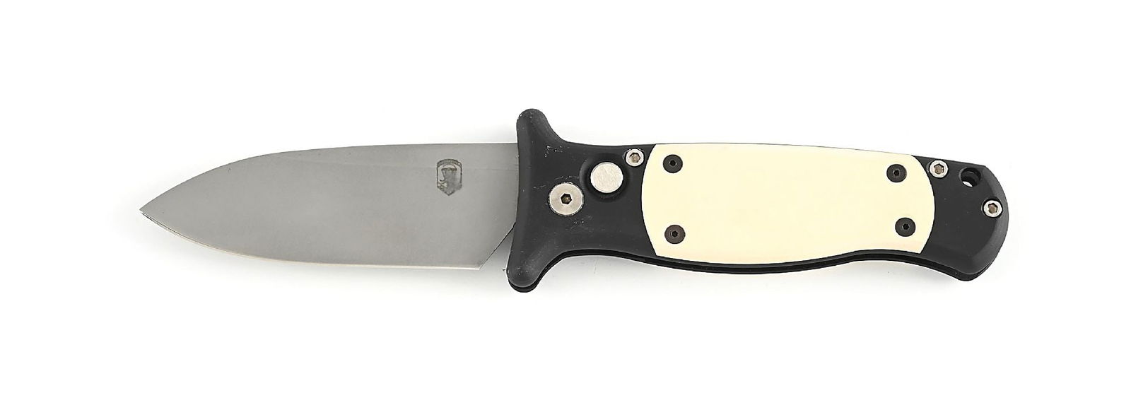 C. 1990S ROB DALTON SOLDIER OF FORTUNE PUSH BUTTON SWITCHBLADE. PARACHUTE LOGO. RED HANDLES.: Appears unused and unsharpened. Blade obverse is marked with the Parachute logo. Thick blade steel. Anodized aluminum frame. Red handles. White micarta inserts. Works fine. Locks open firmly. Closed