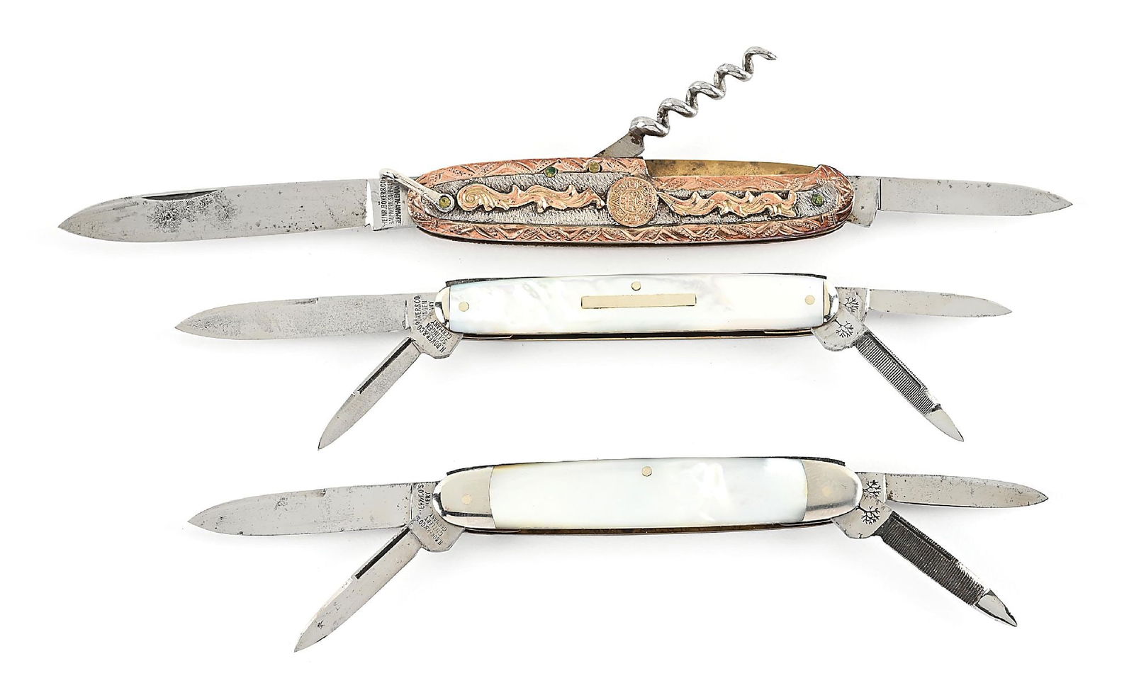 LOT OF 3: H. BOKER & CO. SOLINGEN GERMANY GOLD AND SILVER SENATORS AND BARTENDER POCKET KNIVES.: Lot consists of: (A) Appears lightly used and lightly sharpened. “H. BOKER & CO. BAUMWERK SOLINGEN GERMANY ALEMANIA” tang stamped on obverse. Tree brand logo stamped on back tang.