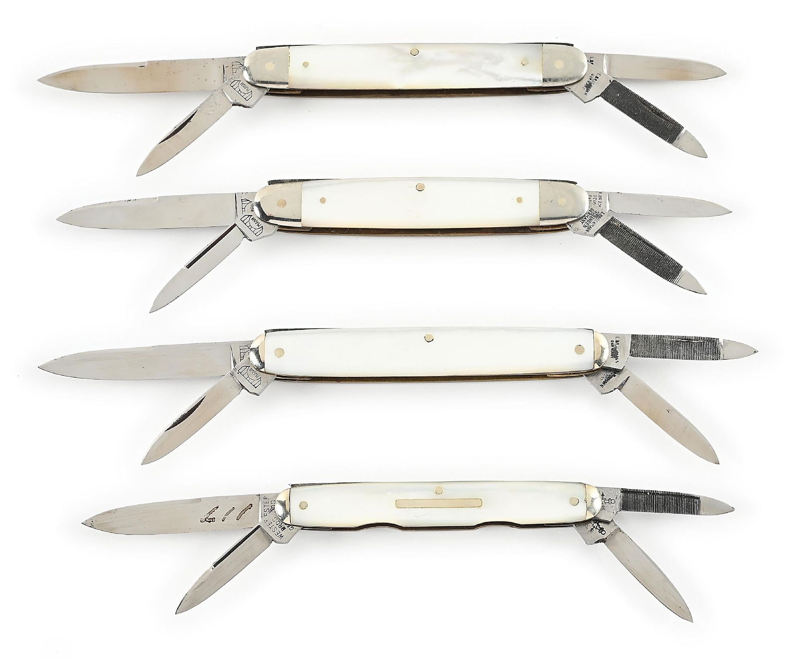 LOT OF 4: BRUCKMANN AND WESTER BROS. MOTHER OF PEARL FOUR BLADE SENATOR POCKET KNIVES.: Lot consists of: (A) Appears unused and unsharpened. Four blade senator. “E. Bruckmann Germany” tang stamped on reverse of all blades with the bridge logo and “MANN” tang