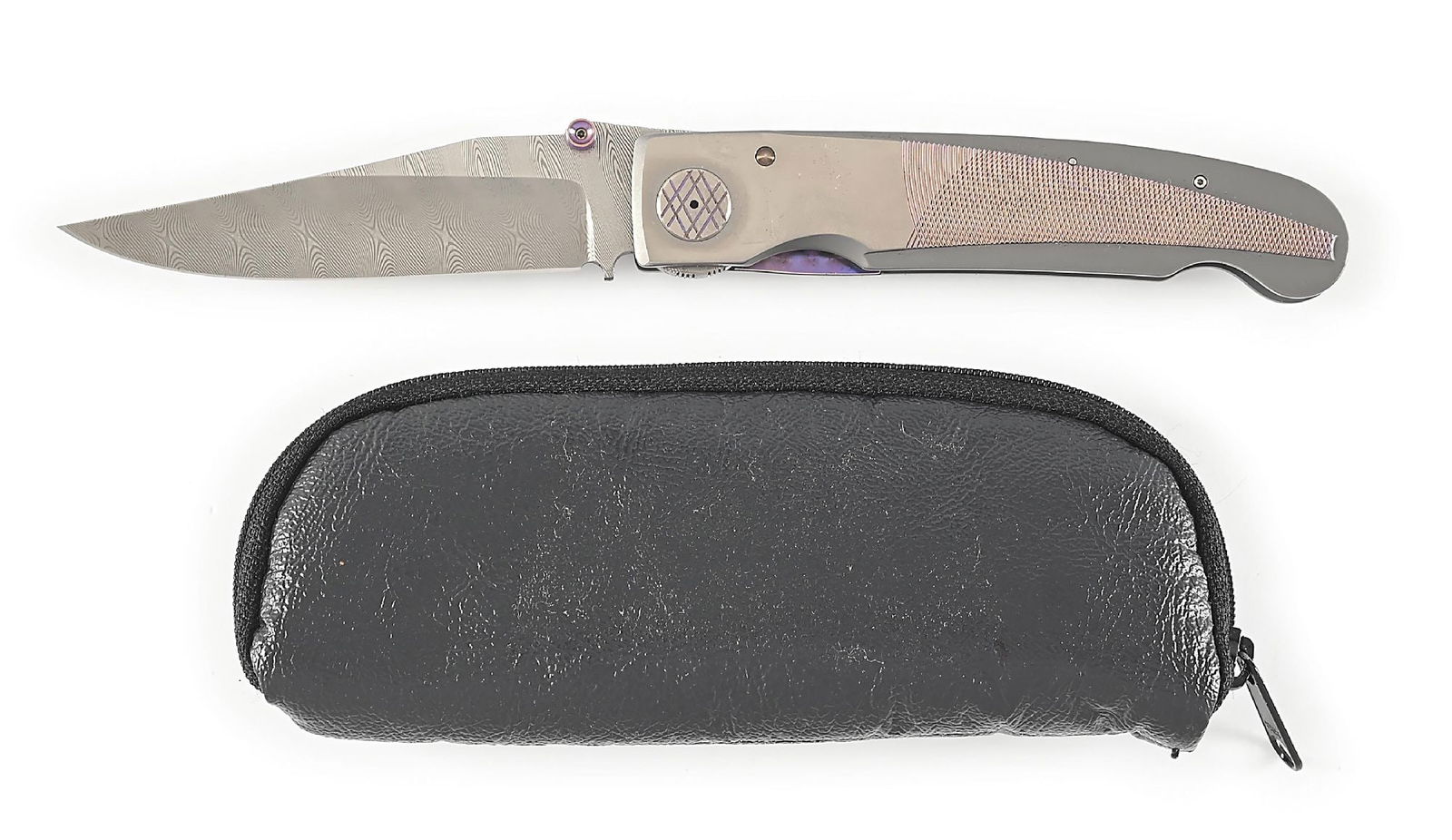 VERY RARE CUSTOM MADE MICHAEL WALKER TITANIUM PROTOTYPE DAMASCUS LINER LOCK FOLDER.: Appears unused and unsharpened. Titanium frame and liner. Damascus blade. Marked “PROTO” inside the titanium back spacer. Locks open firmly. Pocket clip. Engraved “WALKER” in