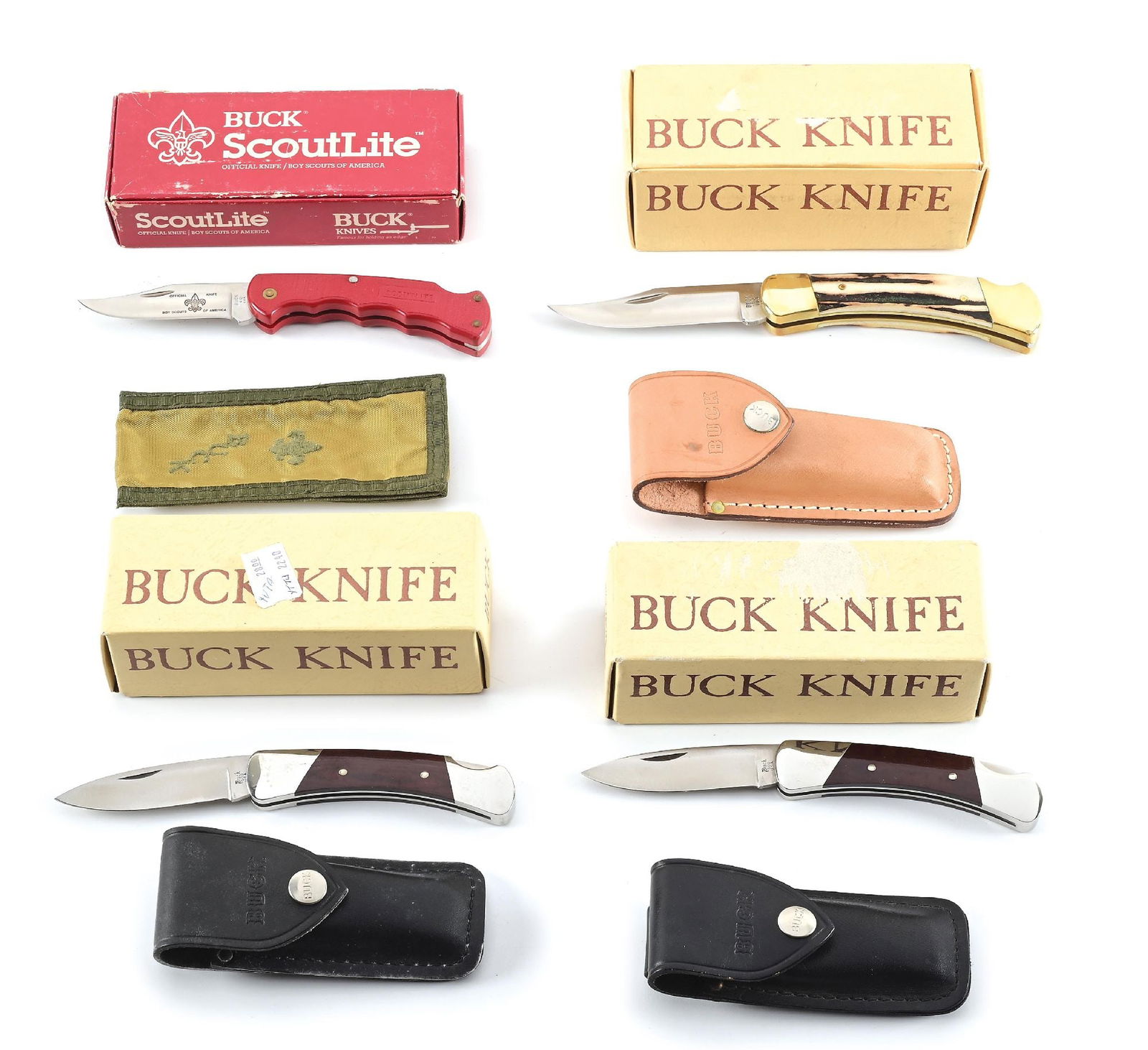LOT OF 4: BUCK FOLDING LOCK BACK KNIVES IN ORIGINAL BOXES. (1 of 11)