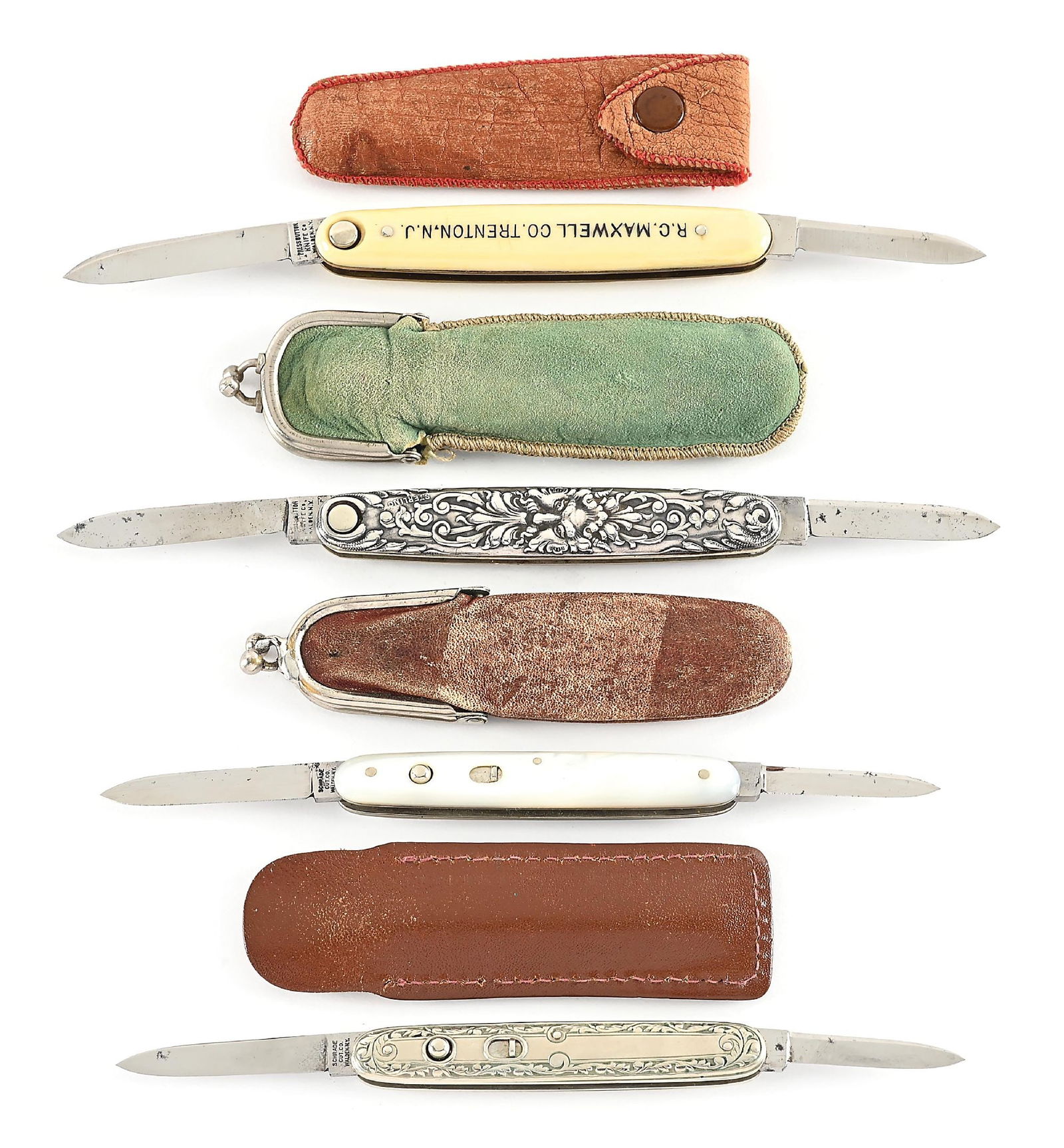 LOT OF 4: PRESS BUTTON AND SCHRADE CUT CO. WALDEN, NY DOUBLE BLADE SWITCHBLADES.: Lot consists of: (A) Appears unused and unsharpened. Both blades are tang stamped “PRESS BUTTON KNIFE CO. WALDEN, NY” on obverse. Brass liners. Imitation ivory celluloid handles. Works fin