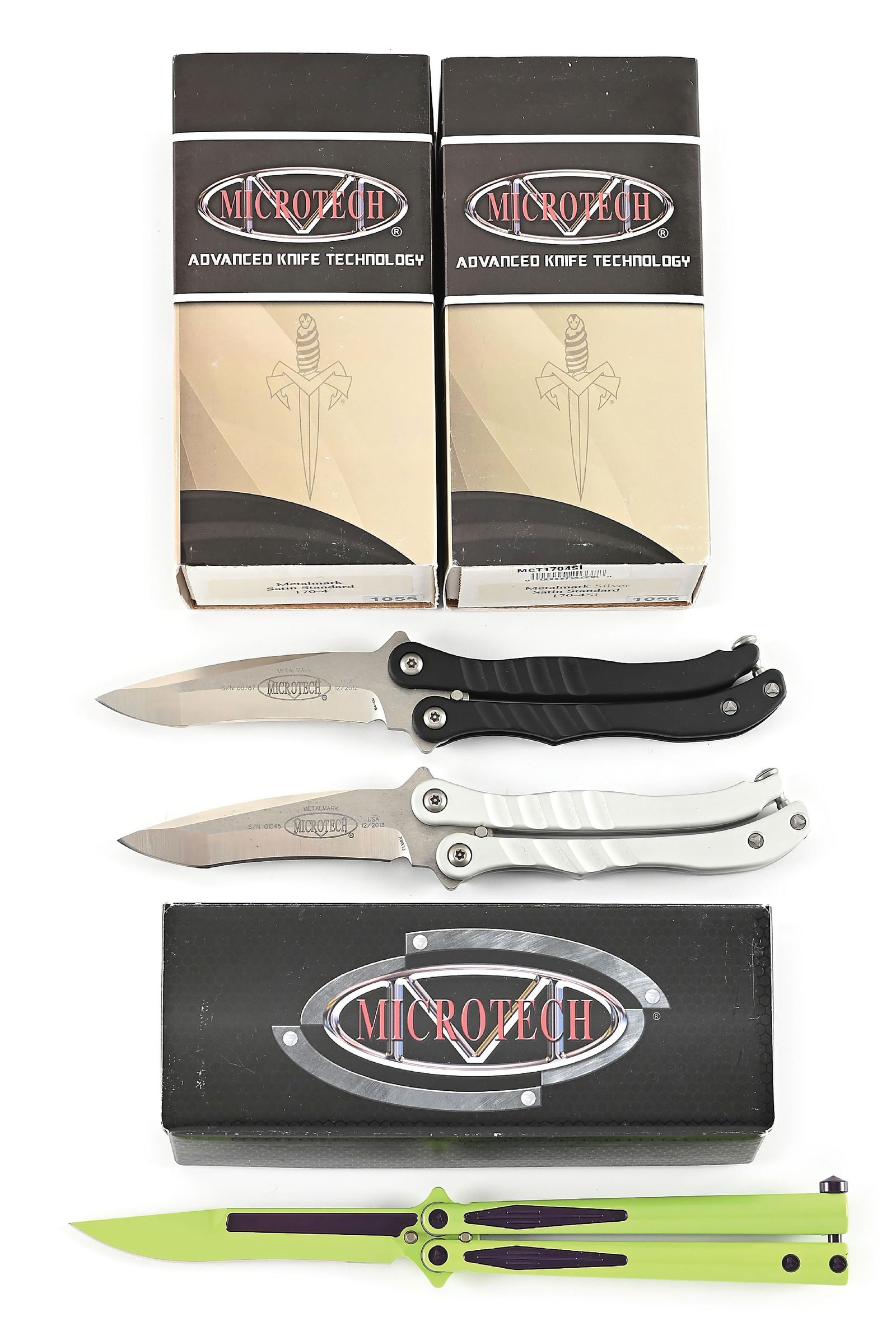 LOT OF 3: BOXED MICROTECH METALMARKS AND TACHYON.: Lot consists of: (A) Microtech Metalmark that features a satin finished recurve chisel ground 154-CM blade with swedge. Blade is marked "METALMARK". Numbered "S/N 00787" and dated "12/2012". Black alu