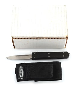 MICROTECH UTX 70 CARBON FIBER HANDLE OTF AUTOMATIC KNIFE.