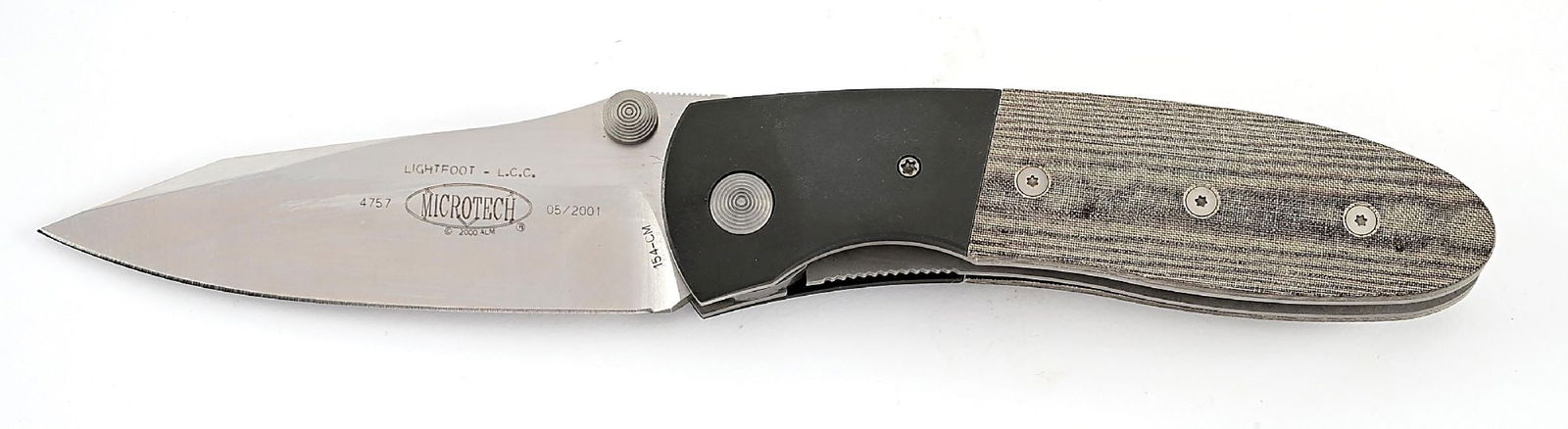 BOXED AND SEALED MICROTECH LIGHTFOOT. - 2