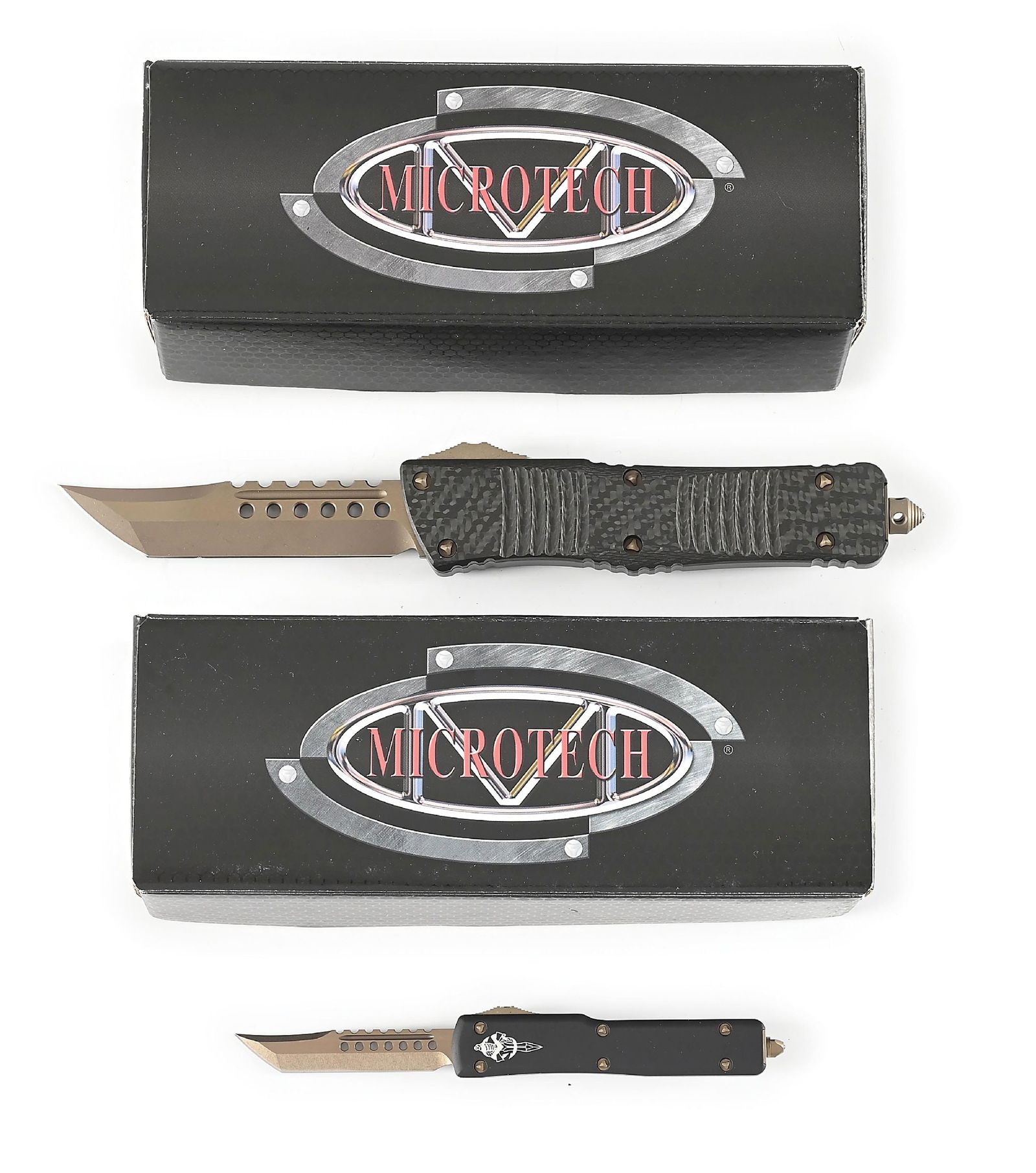 LOT OF 2: BOXED MICROTECH COMBAT TROODON HELLHOUND AND HELLHOUND.: Lot consists of: (A) Microtech Combat Troodon Hellhound that features a bronzed hellhound blade. Black aluminum frame with carbon fiber face scale and bronzed stainless steel tip down clip. Bronzed no
