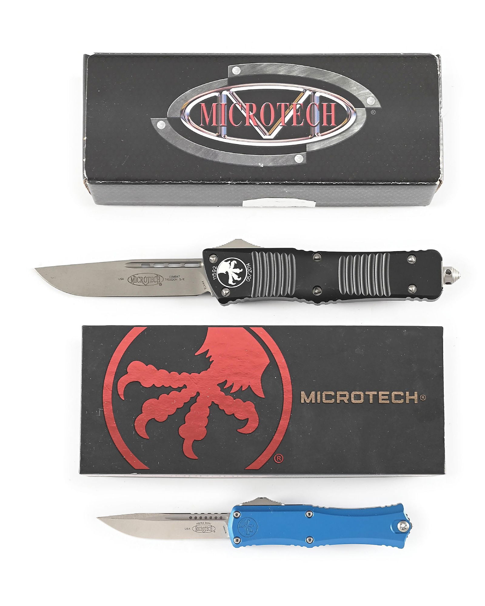 LOT OF 2: BOXED MICROTECH COMBAT TROODON AND HERA II MINI.: Lot consists of: (A) Microtech Combat Troodon Hellhound S/E Apocolyptic Standard that features a stonewashed elmax blade marked "USA" and "COMBAT TROODON S/E" with Microtech logo. Black aluminum frame