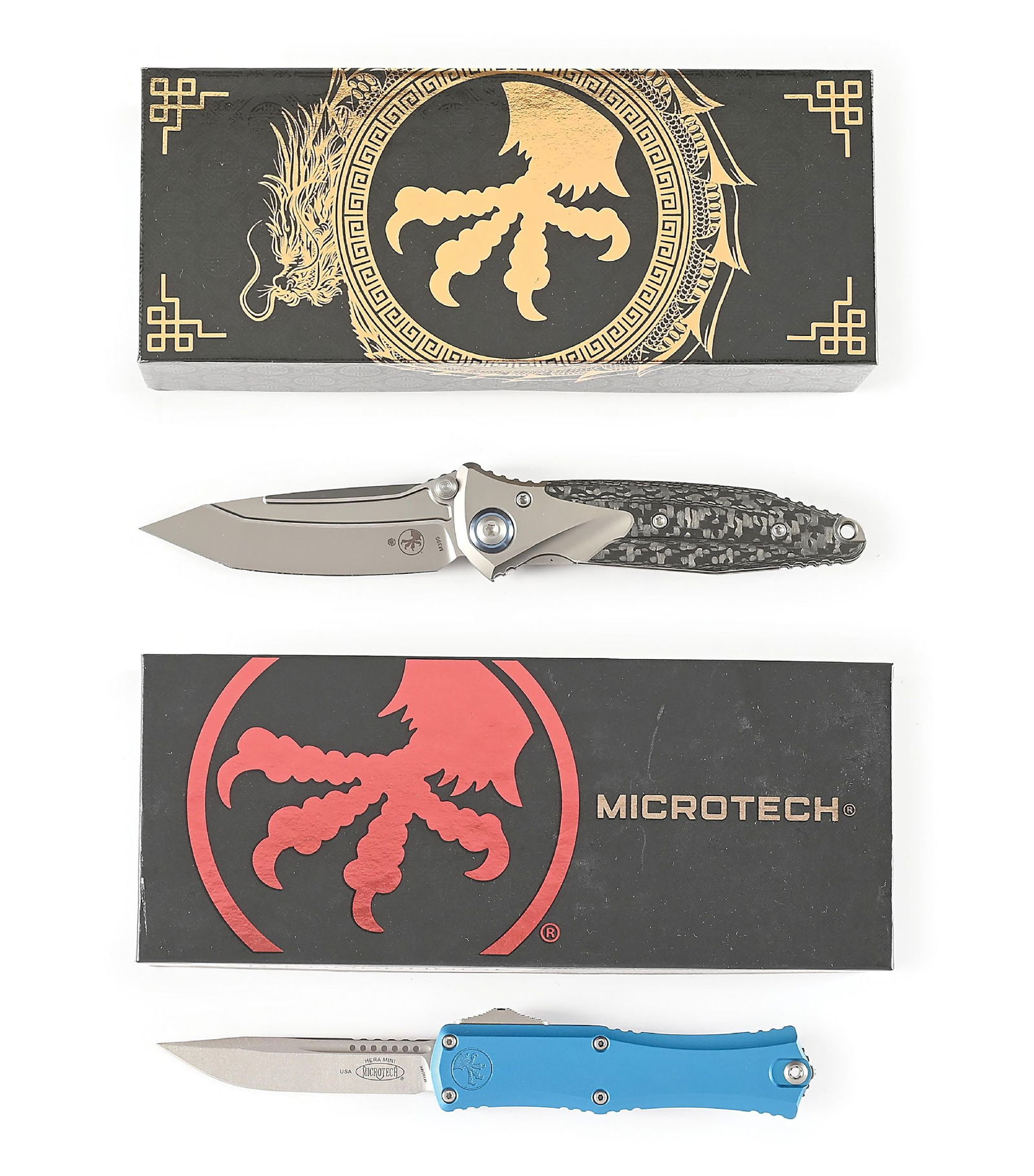 LOT OF 2: BOXED MICROTECH SOCOM BRAVO MINI AND HERA II MINI.: Lot consists of: (A) Microtech SOCOM Bravo Mini T/E that features a bead blasted M390 blade marked with Microtech's eagle claw logo. Dual thumb studs. Titanium handle with carbon fiber scales and blue