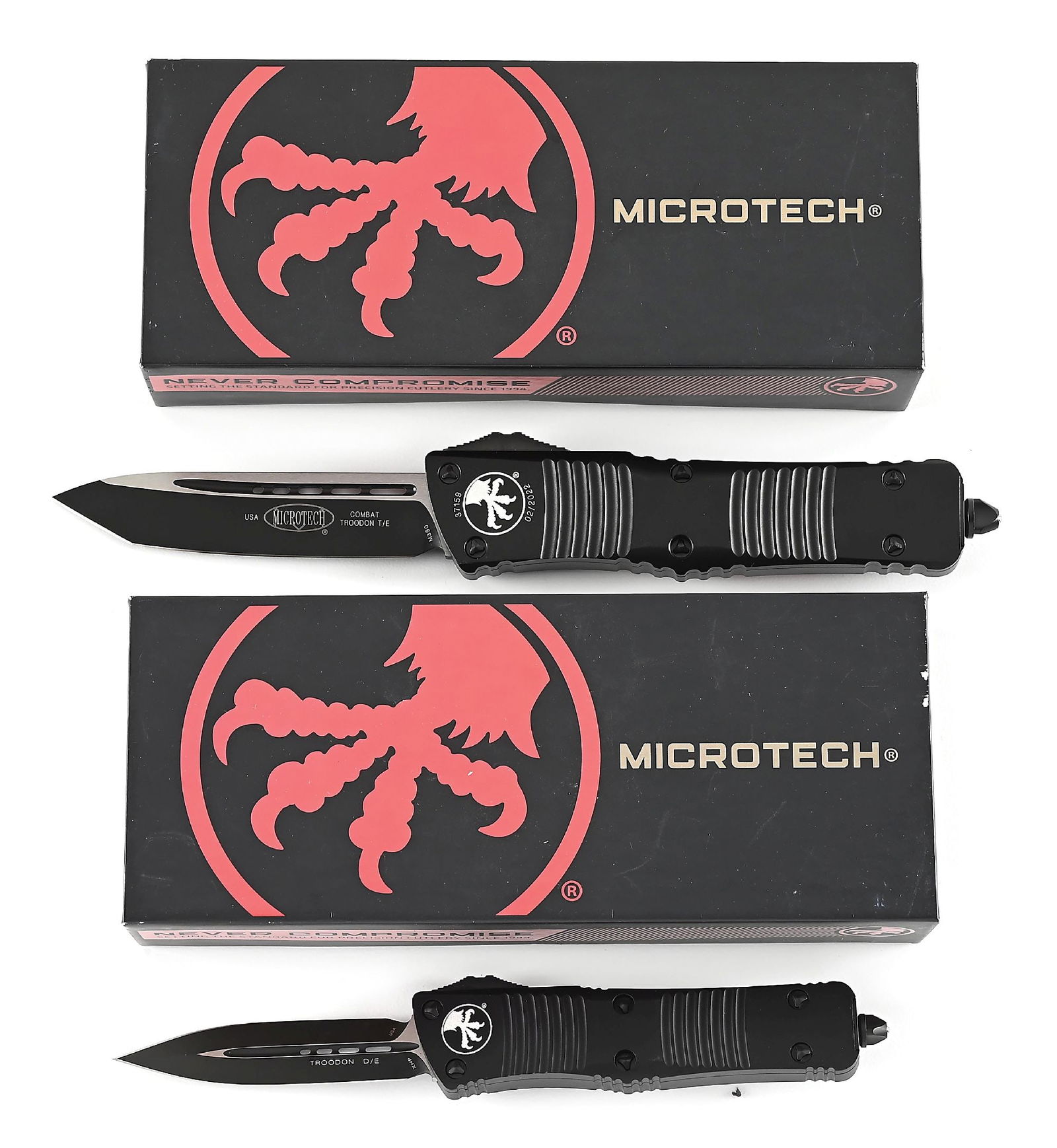 LOT OF 2: BOXED MICROTECH COMBAT TROODON AND TROODON.: Lot consists of: (A) Microtech Combat Troodon T/E that features a black and satin M390 blade marked "USA" and "COMBAT TROODON T/E" with Microtech logo. Black aluminum frame with ribbing. Black stainle