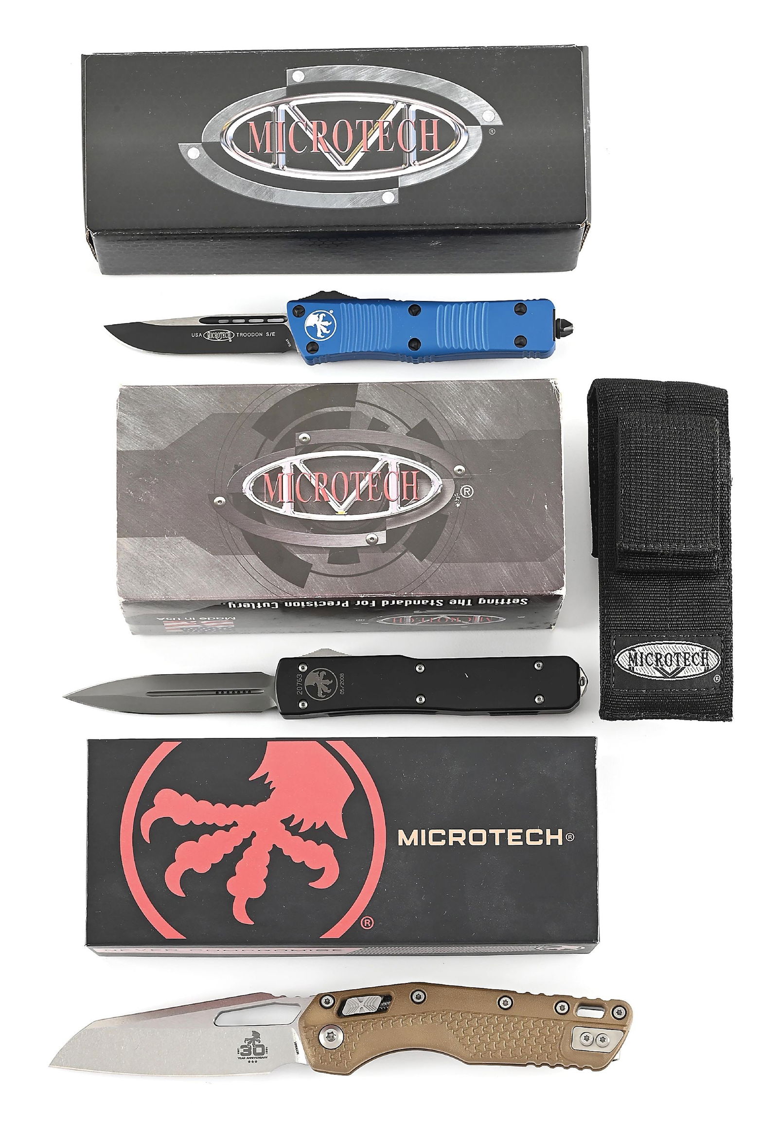 LOT OF 3: BOXED MICROTECH TROODON, ULTRATECH, AND MSI: Lot consists of: (A) Microtech Troodon S/E that features a black elmax blade with satin flats marked "USA" and "TROODON S/E" with Microtech logo. Blue aluminum frame with ribbing and black stainless s