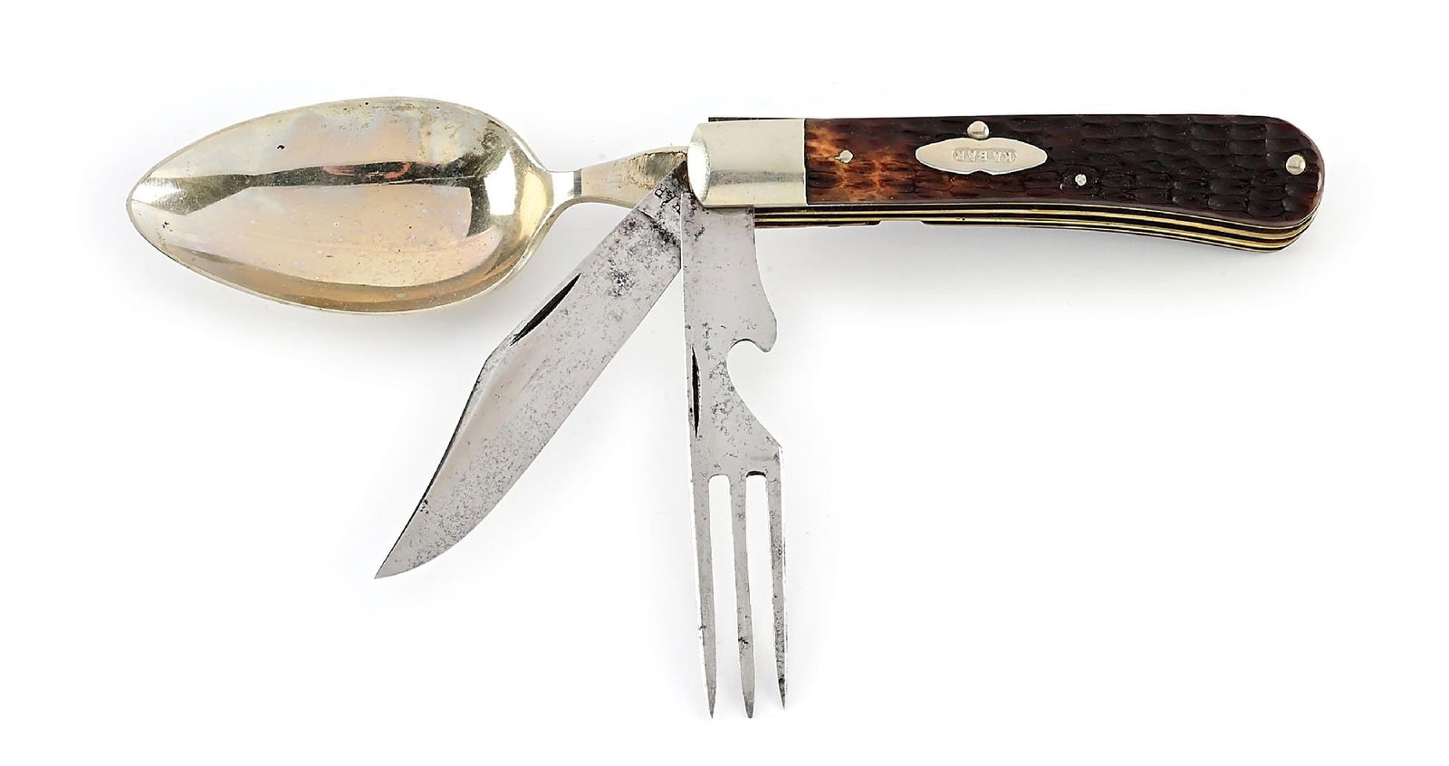 KA-BAR BONE STAG HANDLE SMALL THREE BLADE HOBO SLIDE-APART KNIFE.: C. 1920s. Stamped “KA-BAR” on obverse of main blade. Appears lightly used and lightly sharpened. Nickel silver bolsters. Brass liners. All blades open and close with snap. Slides apart to