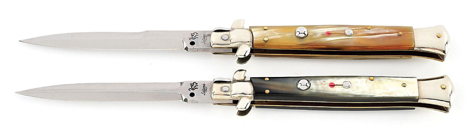 LOT OF 2: DISCONTINUED WALT’S LATAMA ITALY WITH CAT LOGO SWIVEL BOLSTER STILETTOS.: Lot consists of: (A) Latama Italy swivel bolster stiletto switchblade with honey horn handles. Appears unused and unsharpened. Bayonet blade tang is marked “Latama ITALY” with the Cat logo