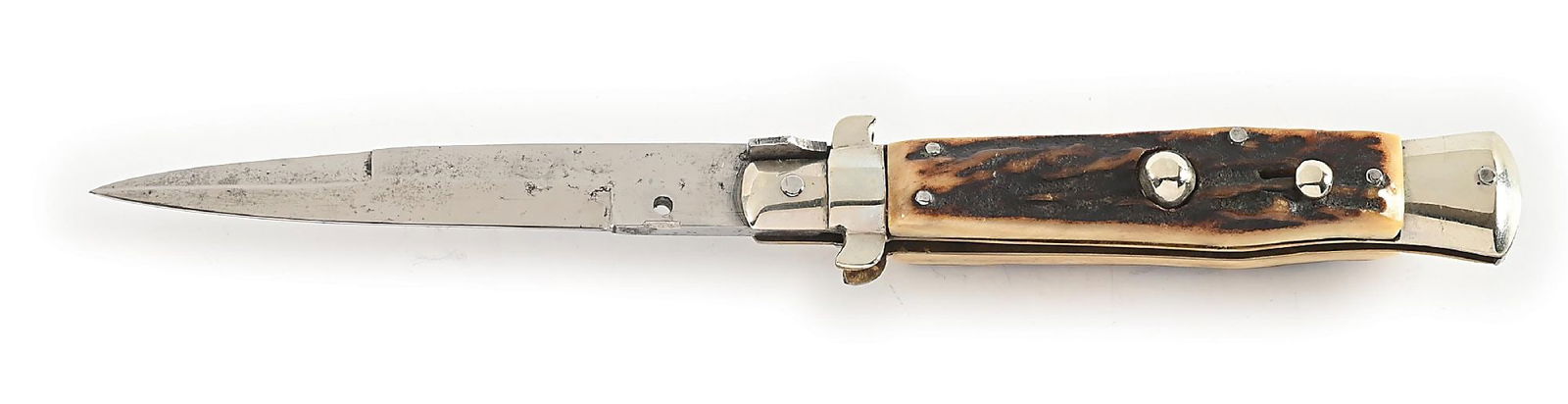 RARE C.1920S-30S UNMARKED ITALIAN STILETTO FLAT GUARD PICK LOCK SWITCHBLADE WITH STAG HANDLES.: Appears unused with a full blade that has light age spots and stains. Unmarked bayonet blade (most likely Maniago made). Stag handles. Nickel silver flat guard top bolsters (small ears). Brass liners.