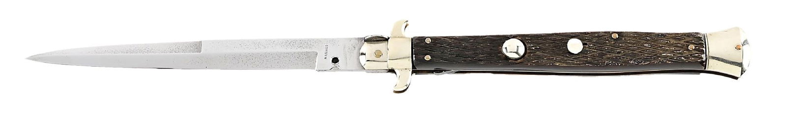 RARE C.1920S-30S MANIAGO MARKED BAYONET BLADE ITALIAN STILETTO PICK LOCK SWITCHBLADE WITH CHECKERED: Appears lightly used. The blade is tang stamped “MANIAGO” on obverse. Bayonet half grind dagger blade. Flat top with flat guard. Checkered cow horn handles. Nickel silver bolsters and bras