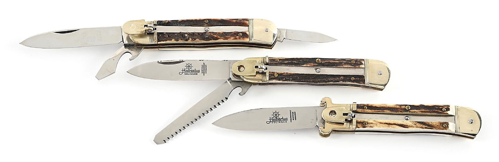 LOT OF 3: C.1970S-90S HUBERTUS STAG HANDLE LEVER LOCK SWITCHBLADES INCLUDING SHOT SHELL PULLER AND: Lot consists of: (A) Appears unused and unsharpened. Marked “Germany”. One blade Shot shell puller lever lock. Blade is fully etched on obverse. Works fine. Locks open firmly. Nickel