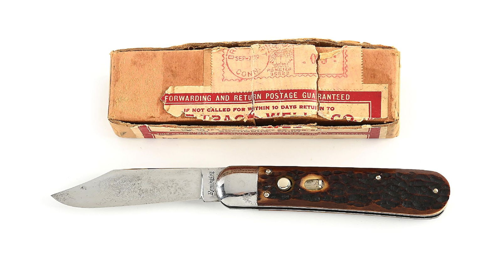 C. 1930S REMINGTON 2303 PATTERN JIGGED BONE HANDLE SWITCHBLADE.: Appears lightly used and lightly sharpened. Full clip blade is tang marked “Remington” on obverse and “R2303.” on reverse. Blade retains full etching that reads