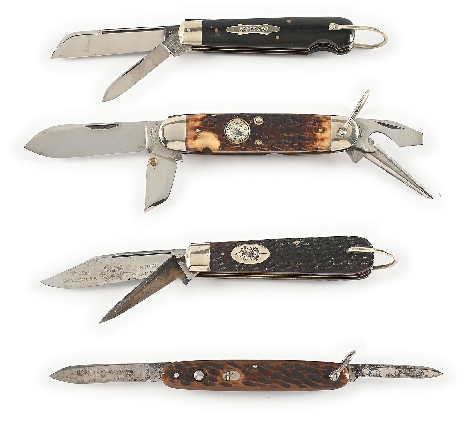 LOT OF 4: DASCO SCOUT, CATTARAUGUS SCOUT, NEW YORK KNIFE SCOUT, PRESTO SWITCHBLADE GIRL SCOUT KNIVES: Lot consists of: (A) Appears unused and unsharpened. DASCO ROCKFORD, IL. two blade EZ open jack with BOY SCOUT shield. Ebony handles and bail. All blades are tang stamped on obverse. Closed length 3 -