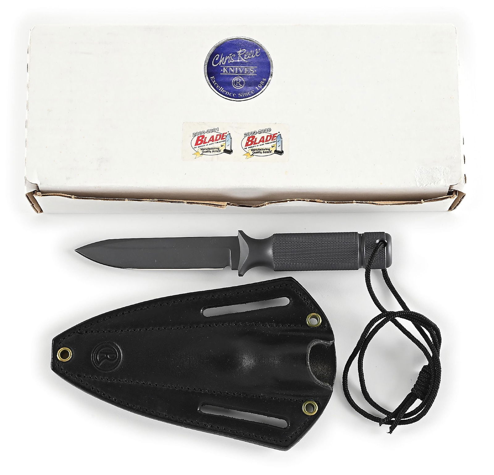 BOXED CHRIS REEVE SHADOW III.: Features a dark A2 blade marked "CR" on obverse and "MADE IN USA" on reverse cheek. Hidden tang construction with knurled hollow handle that features a removable pommel and wrist thong. Complete with