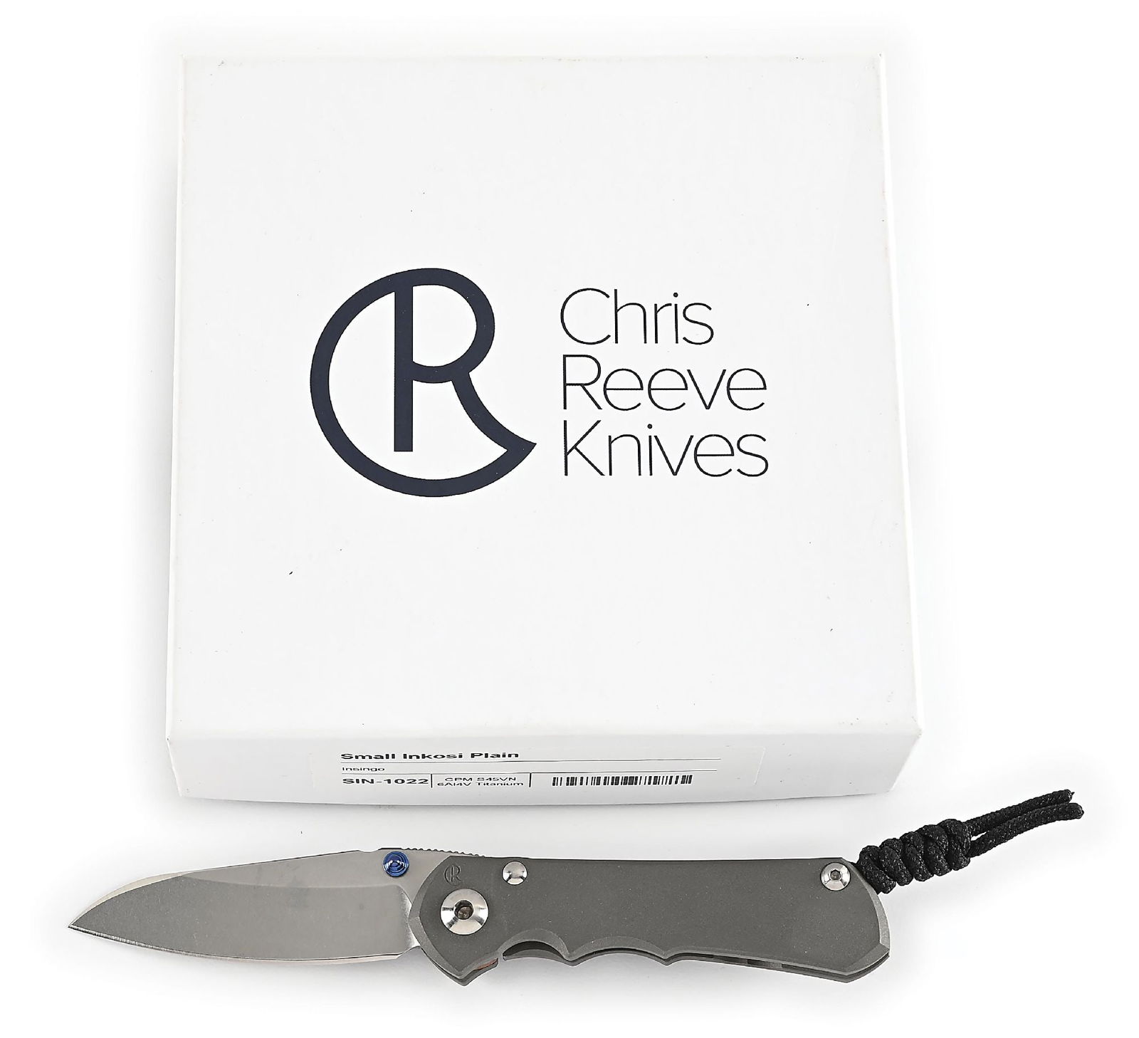 BOXED CHRIS REEVE SMALL INKOSI PLAIN.: Features an insingo S45VN blade with anodized titanium thumb stud and knurled thumb rest. Titanium frame is marked near the pivot screw on obverse with the “CR” logo and "IDAHO MADE" on