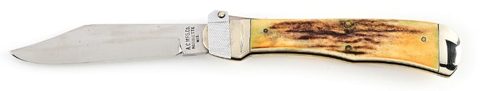A.C. MFG. CO. MARIENTTE, WIS (AERIAL CUTLERY CO.) STAG HANDLE LEVER LOCK SWITCHBLADE.
