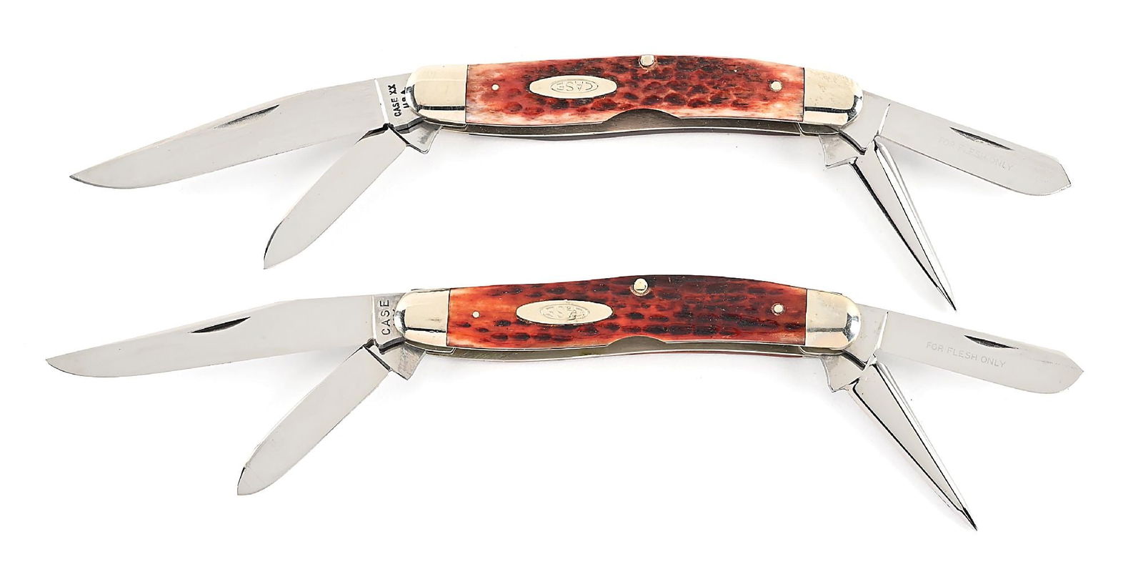 LOT OF 2: CASE XX USA 64047P FIVE DOT AND CASE XX 64047P FOUR BLADE STOCKMANS WITH PUNCH BLADE: Lot consists of: (A) C. 1975 64047P XX USA five dot red bone stockman with punch. Appears unused and unsharpened. The main blade is tang stamped “CASE XX USA” with five dots underneath on