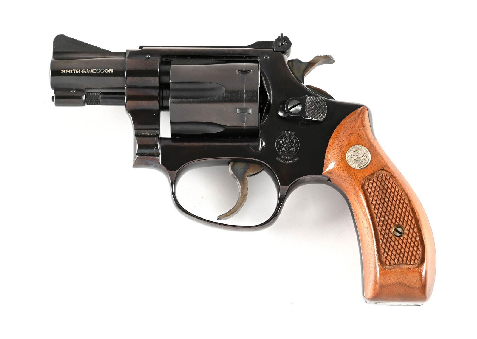 (C) SMITH & WESSON MODEL 34-1 DOUBLE ACTION REVOLVER WITH BOX: Referred to as the Model 1953 22/32 Kit gun. This gun dates to about 1968. Built on the later 3-screw J-frame with round butt, pinned barrel, and recessed chambers. Blue finish with case color hammer
