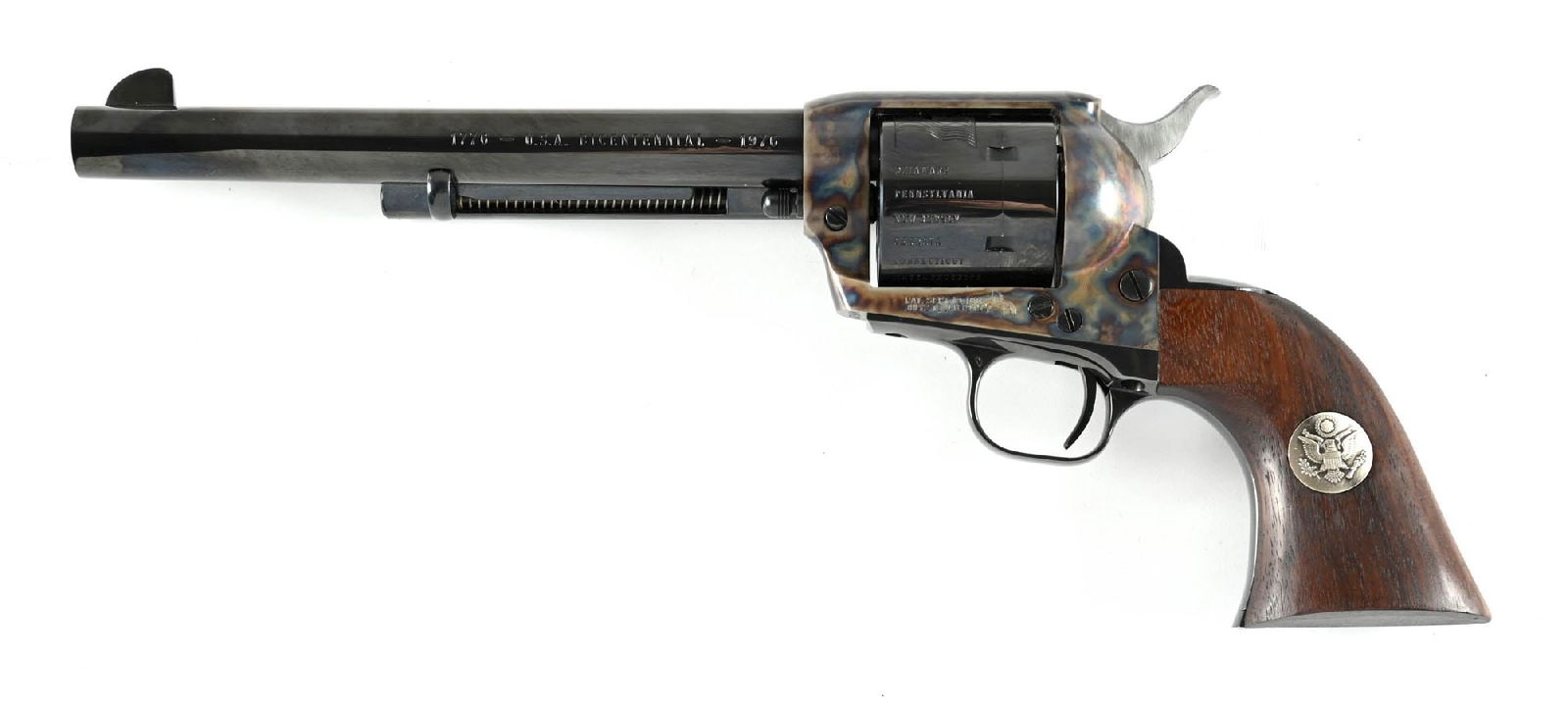 (C) BICENTENNIAL COMMEMORATIVE COLT SINGLE ACTION ARMY REVOLVER.: Manufactured by Colt in 1979. Features a high polish blued finish with vibrant case colors on the frame. Cylinder featuring engravings of states names, a bicentennial flag, and current U.S. flag. One