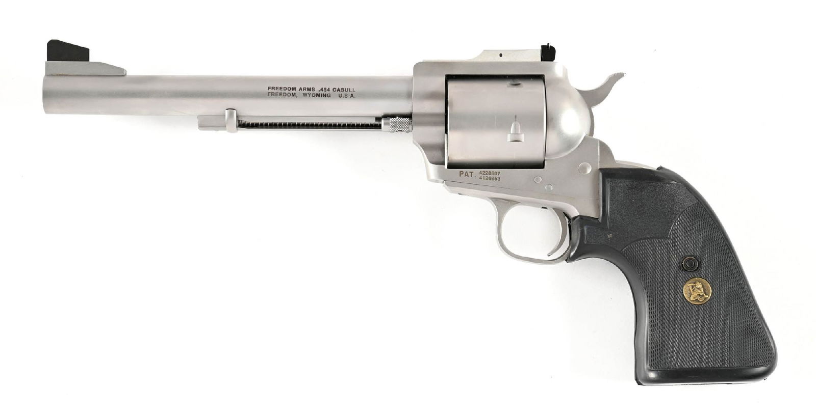 (M) FREEDOM ARMS SINGLE ACTION REVOLVER IN .454 CASULL WITH BOX: Features a flat top frame, an adjustable rear sight, a blade on base front sight, a non-fluted cylinder and a set of Pachmayr rubber grips. It comes in an original box with paperwork. CONDITION: Excel
