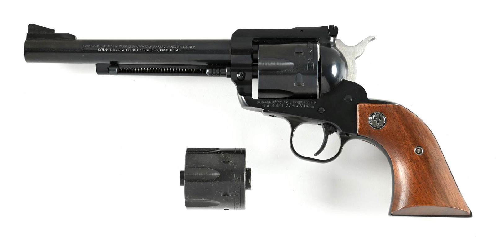 (M) RUGER NEW MODEL BLACKHAWK CONVERTABLE .32 REVOLVER WITH BOX.: Fitted with a .32 H&R Magnum cylinder and accompanied by a spare .32-20 cylinder. Standard New Model with blue finish, target adjustable rear sight, and smooth walnut grips with Ruger medallion. Comes