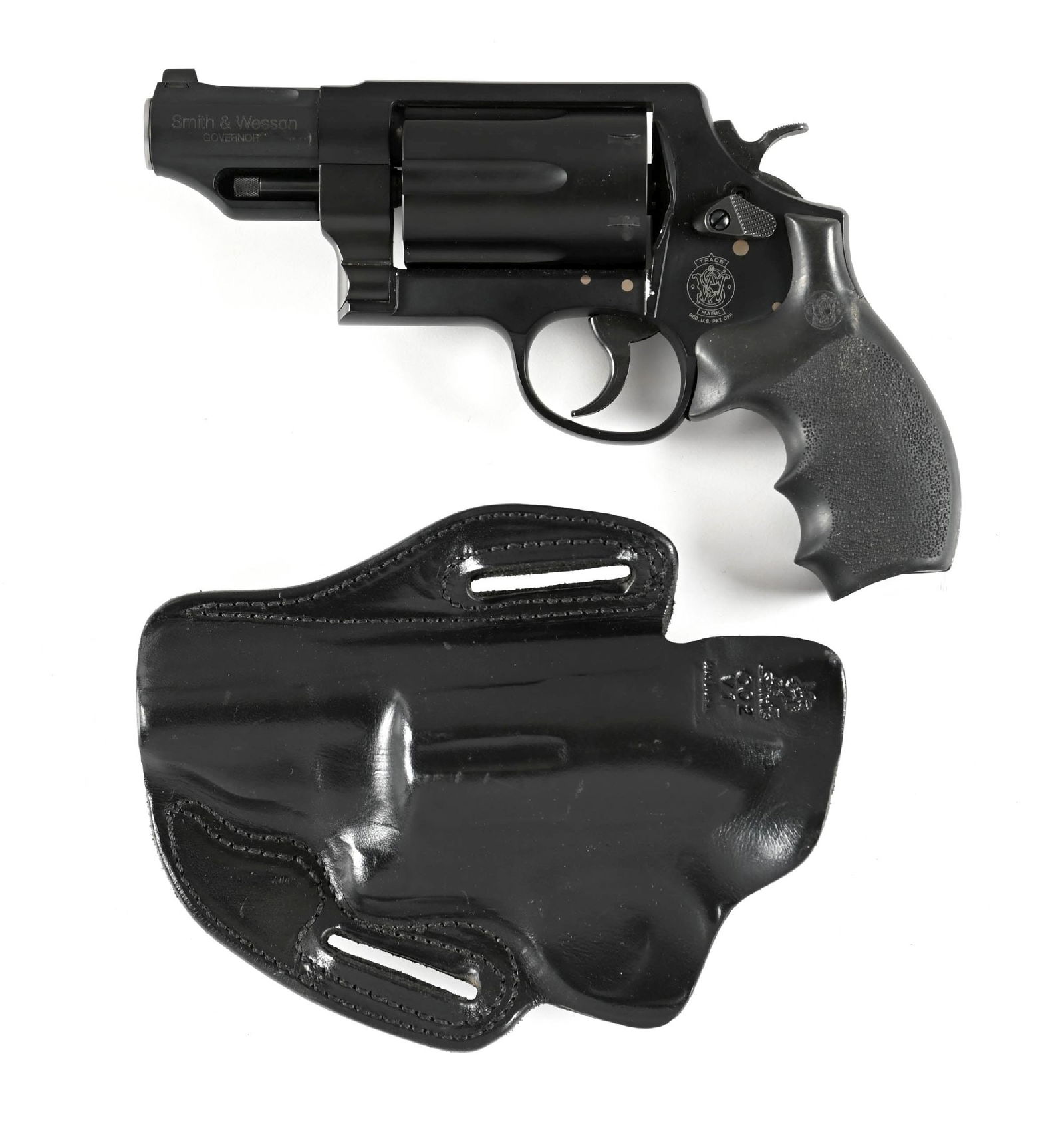 (M) SMITH & WESSON GOVERNOR .410 DOUBLE ACTION REVOLVER: Features a matte finish, fixed sights, and rubber finger groove grips. CONDITION: Shows as near new with some light cylinder face burn, a ghost drag line, nominal handling marks, and is mechanically s
