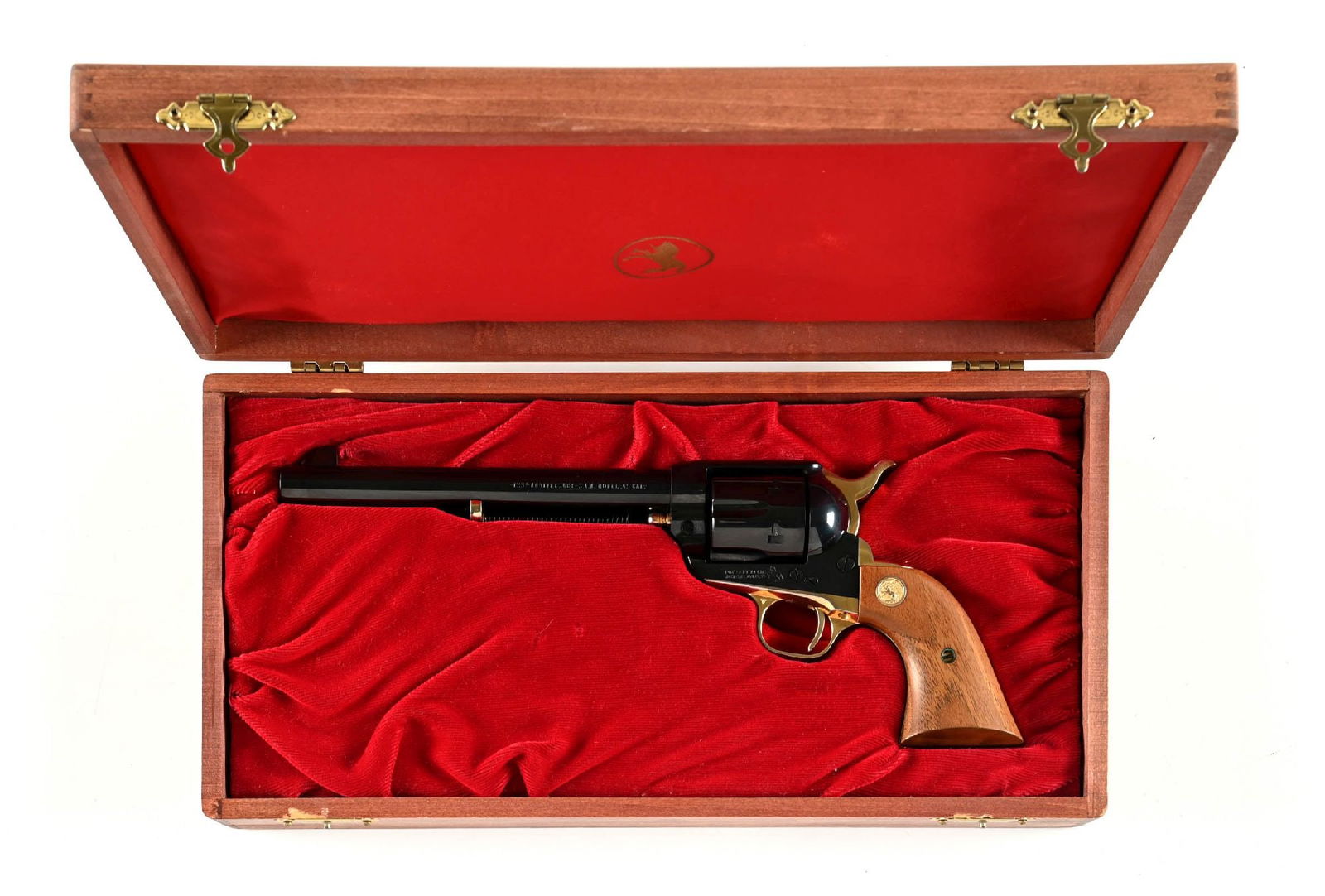 (C) 125TH ANNIVERSARY COLT SINGLE ACTION ARMY REVOLVER WITH CASE.: 7390 of these special second generation Colt single actions were made in 1961. It features the full blue finish, fluted cylinder, and gold plated straps, hammer, and accents. Colt two piece walnut gri