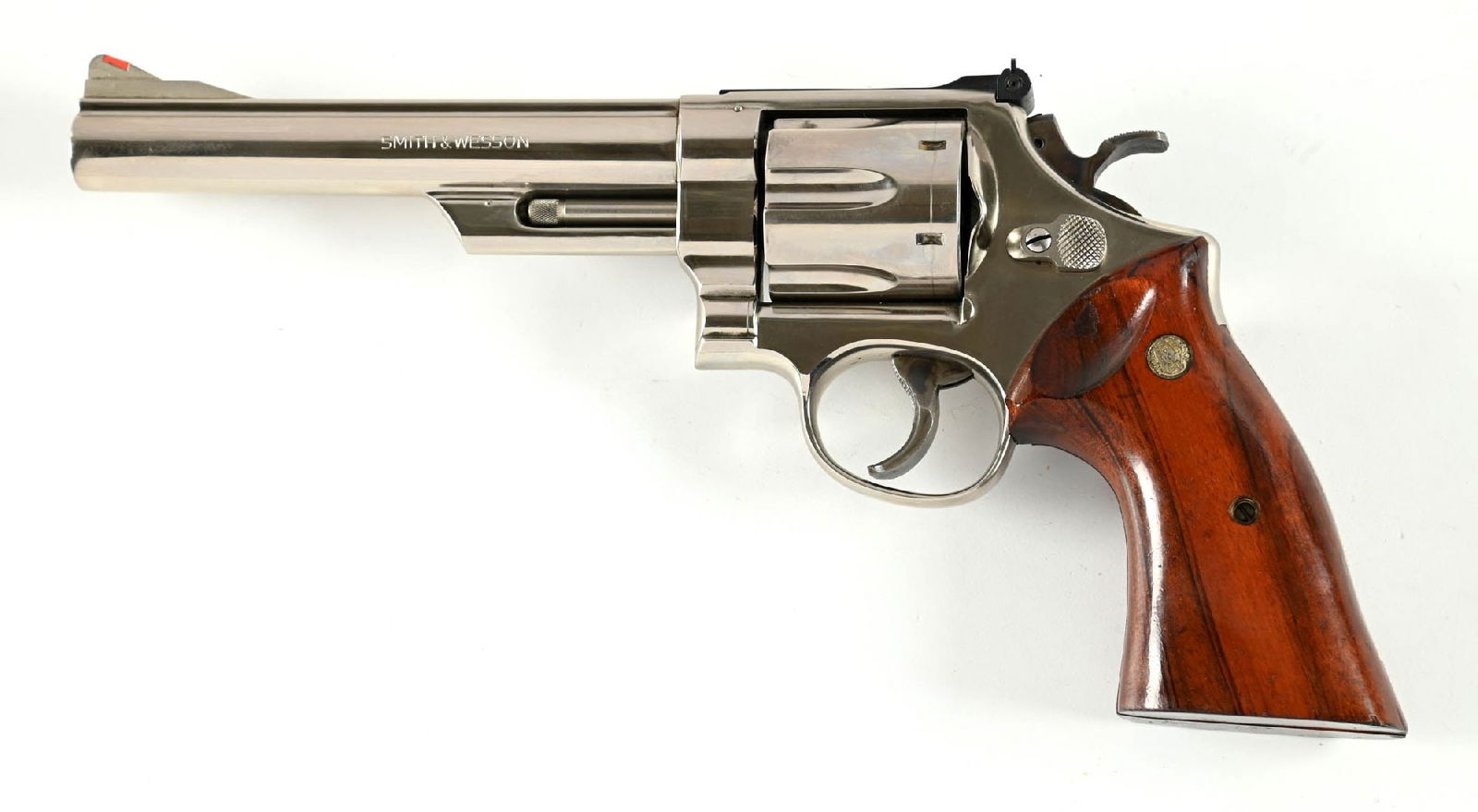 (C) SMITH & WESSON MODEL 29-2 .44 MAGNUM DOUBLE ACTION REVOLVER.: Dates circa 1975-1976. This is the last version of the classic .44 magnum with the pinned barrel and recessed chambers. Built on the square butt 3-screw N-frame with the blued adjustable rear sight, r