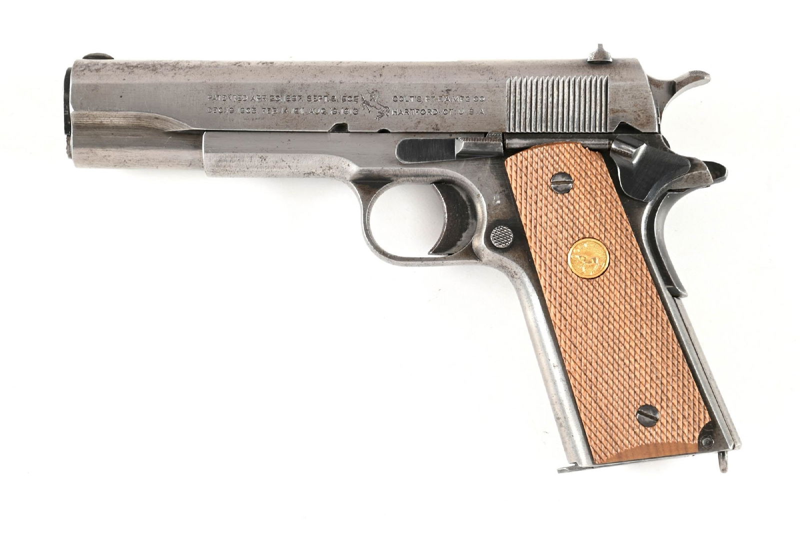 (C) COLT MODEL 1911 US ARMY SEMI AUTOMATIC PISTOL (1918): Dates to 1918. The right side of slide has the "MODEL OF 1911 US ARMY" legend. Someone attempted to remove the "UNITED STATES PROPERTY" stamp on left side of frame but it is still partially visible. T