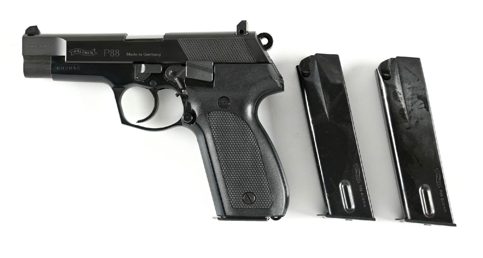 (M) BOXED WALTHER MODEL P88 SEMI-AUTOMATIC PISTOL.: Imported by Interarms and so marked on the right side of slide. It features the dual tone blue finish, a wind drift white dot rear sight, white dot front sight, lightweight hammer, and checkered black