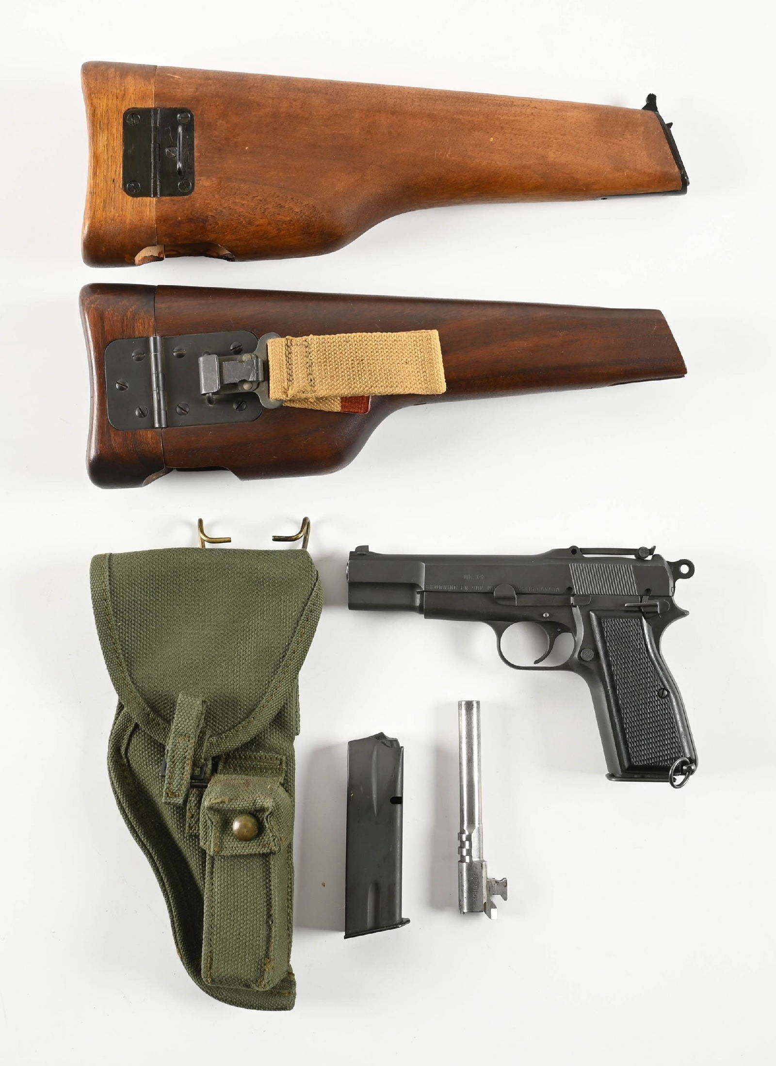 (C) INGLIS MK. I* HI-POWER 9MM SEMI-AUTOMATIC PISTOL WITH HOLSTER/ STOCK: The slide, frame, and barrel have matching serial numbers. The right side of frame has two inspection stamps, one is the CA. Left side of slide has the Inglis Canada MKI stamp. Features the desirable