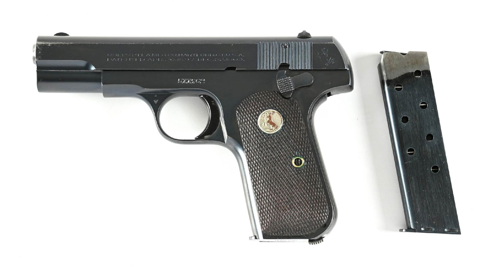 (C) COLT 1903 POCKET HAMMERLESS SEMI AUTOMATIC PISTOL WITH BOX: Dates to 1932. Standard pistol in all respects. Features the Colt checkered walnut grips with silver medallions and comes with two base stamped two-tone tempered magazines. In its original matching nu