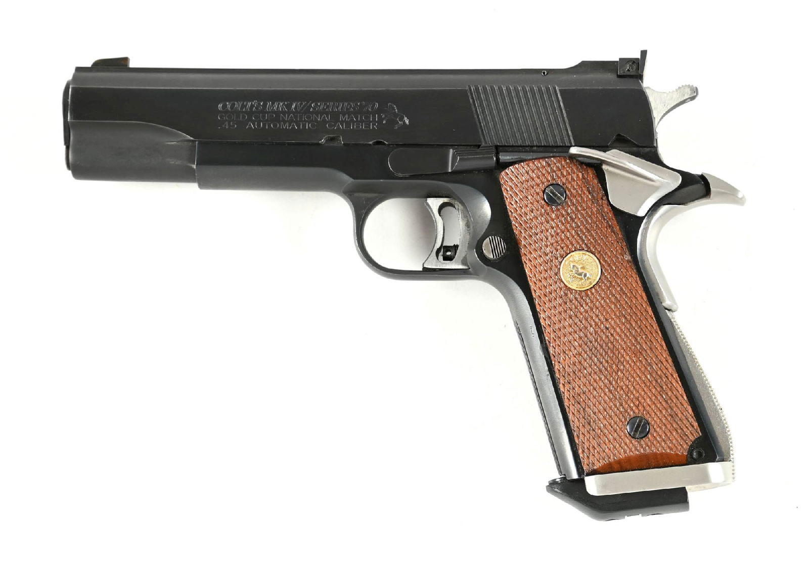 (M) COLT MK IV SERIES 70 GOLD CUP NATINAL MATCH SEMI-AUTOMATIC 1911 PISTOL: Dates to 1982. Both sides of slide have the Gold Cup National Match legends. Features the dual tone blue finish, wide flat slide rib, Elliason target rear sight, beveled ejection port, lightweight tri