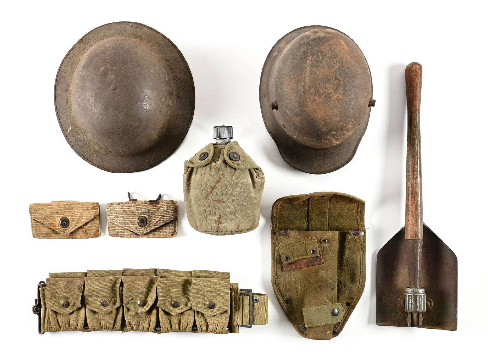 LOT OF US AND GERMAN WWI-WWII HELMETS AND FIELD GEAR. (1 of 1)