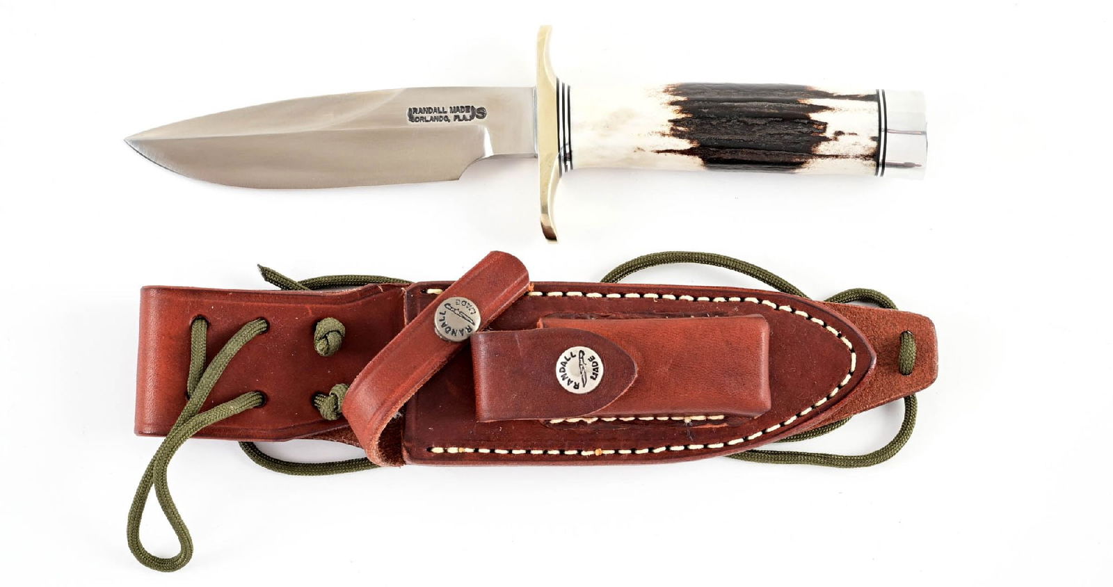 RANDALL COMBAT COMPANION.: Randall Combat Companion that features a drop point blade marked "RANDALL MADE / ORLANDO, FLA." between Randall's signature scimitars with separate "S" denoting stainless steel construction. The blade